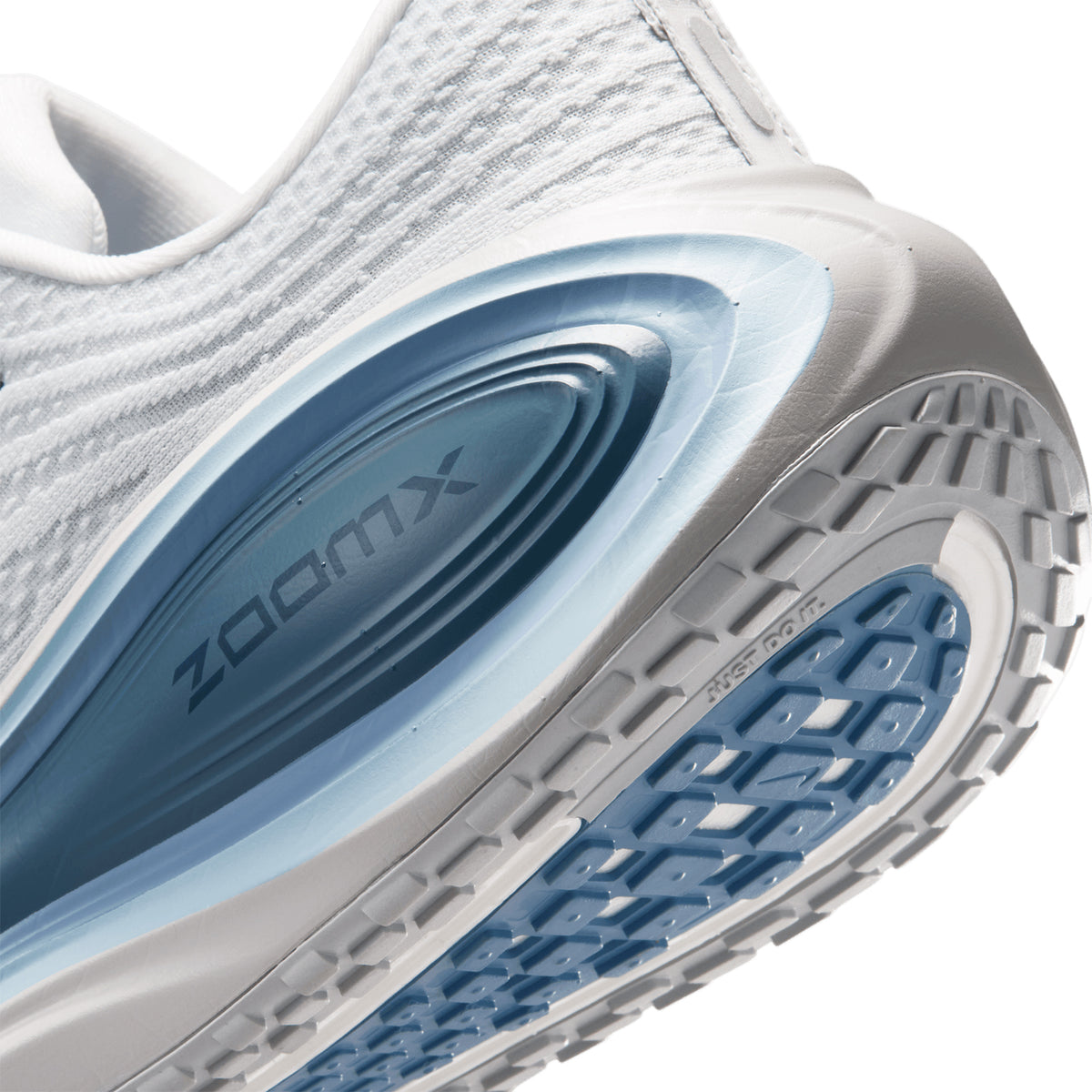 Nike Vomero Plus men's running shoe in Off White / Grey Fog / Thunderstorm / Obsidian — angled side view showing off white engineered mesh upper, responsive cushioning design and grey fog cushioning midsole stack