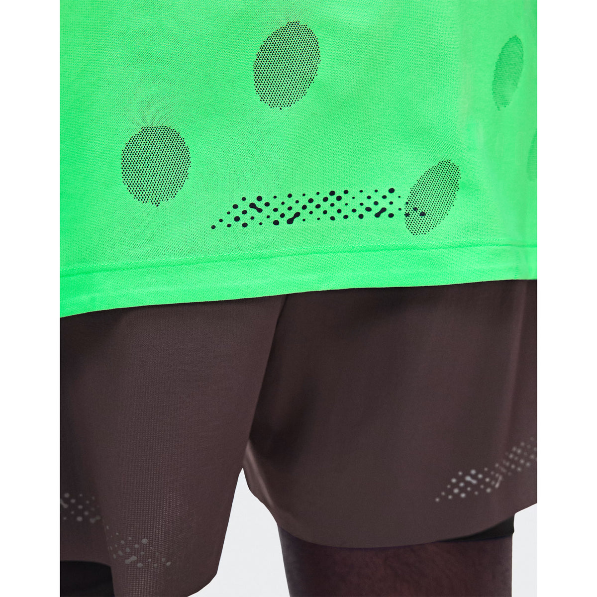 Men's On Zero-T Breathe Verdite close-up of distinctive functional jacquard fabric showing On DryTec breathable moisture-wicking construction for ultralight distraction-free training