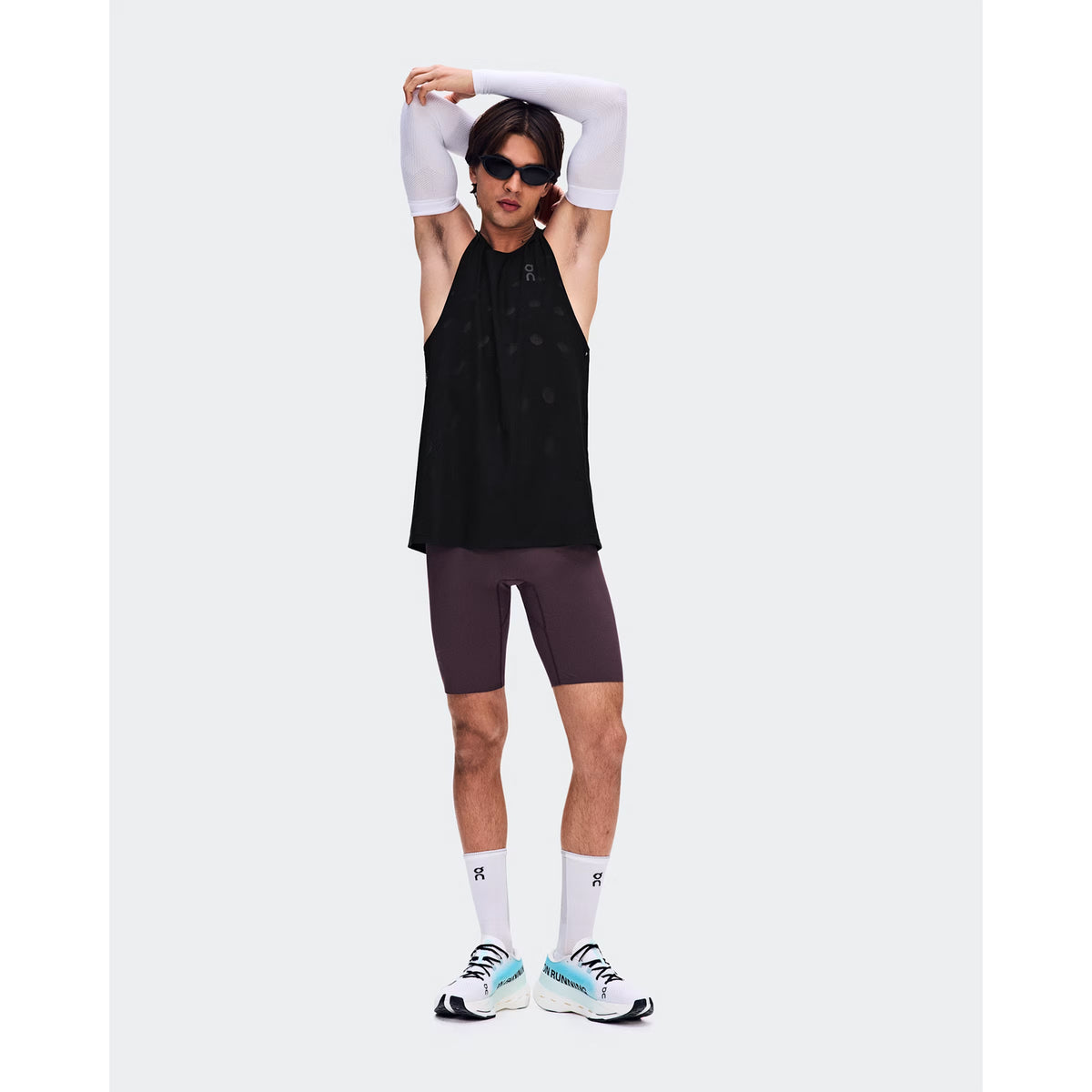 Men's On Zero Half Tights Urchin front full body view on male runner showing OAC athlete-inspired graphic with lightweight moisture-wicking construction for race day and fast training performance