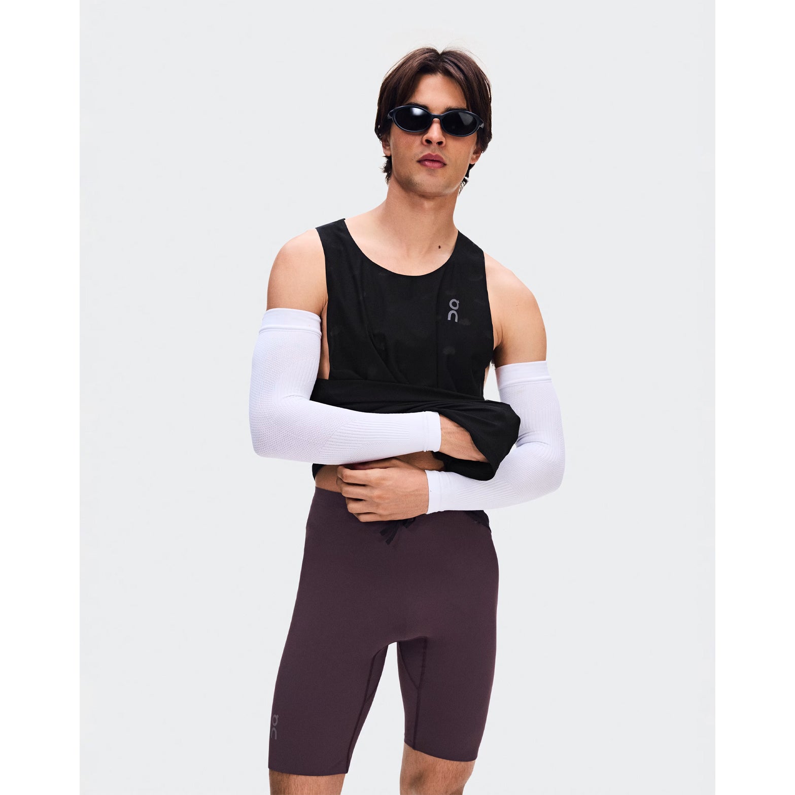 Men's On Zero Half Tights Urchin front view on male runner showing lightweight moisture-wicking technical fabric with OAC-inspired graphic and adjustable waistband for race day performance