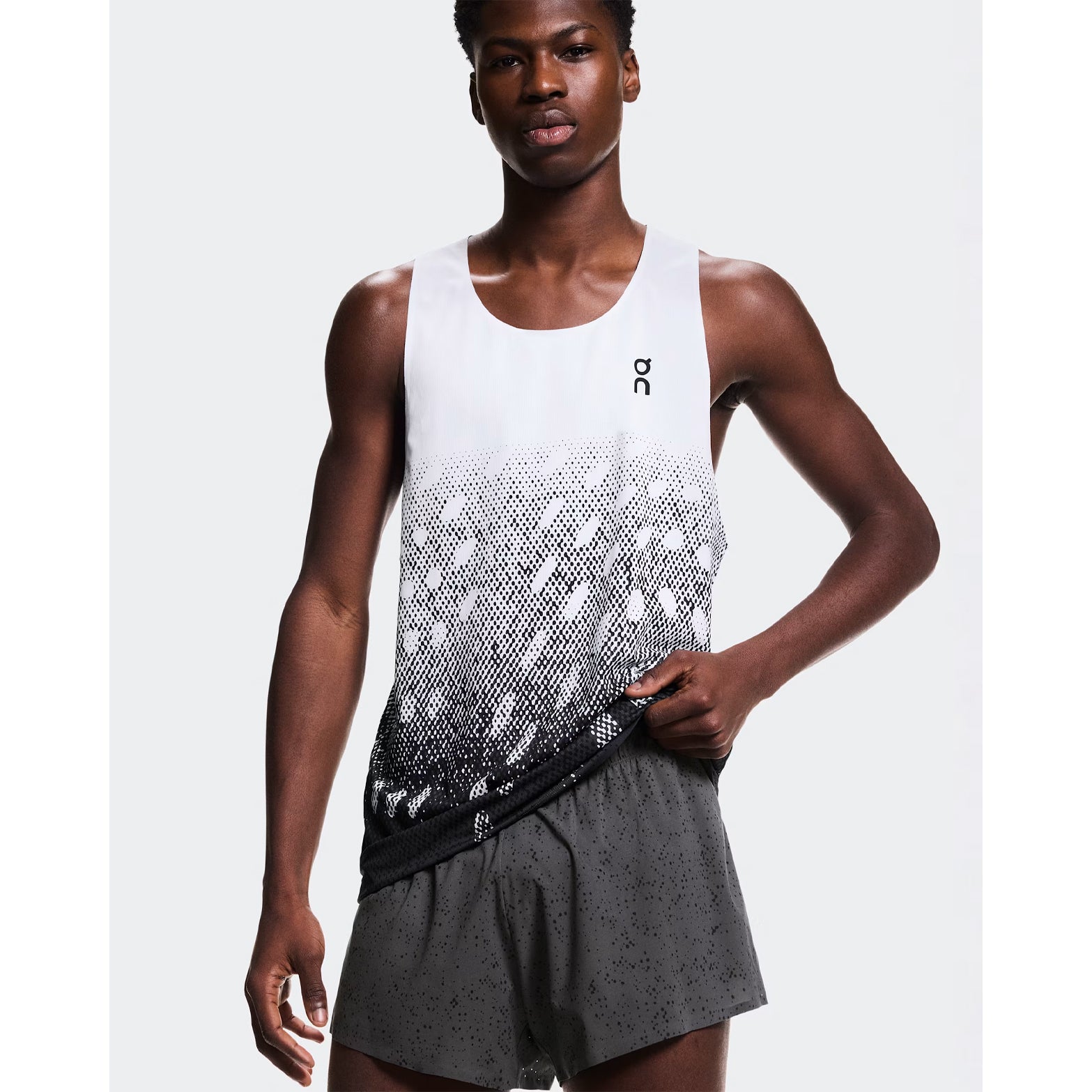 Men's On Zero Shorts Grey Black front view on male runner showing ultra-lightweight construction and race-ready fit