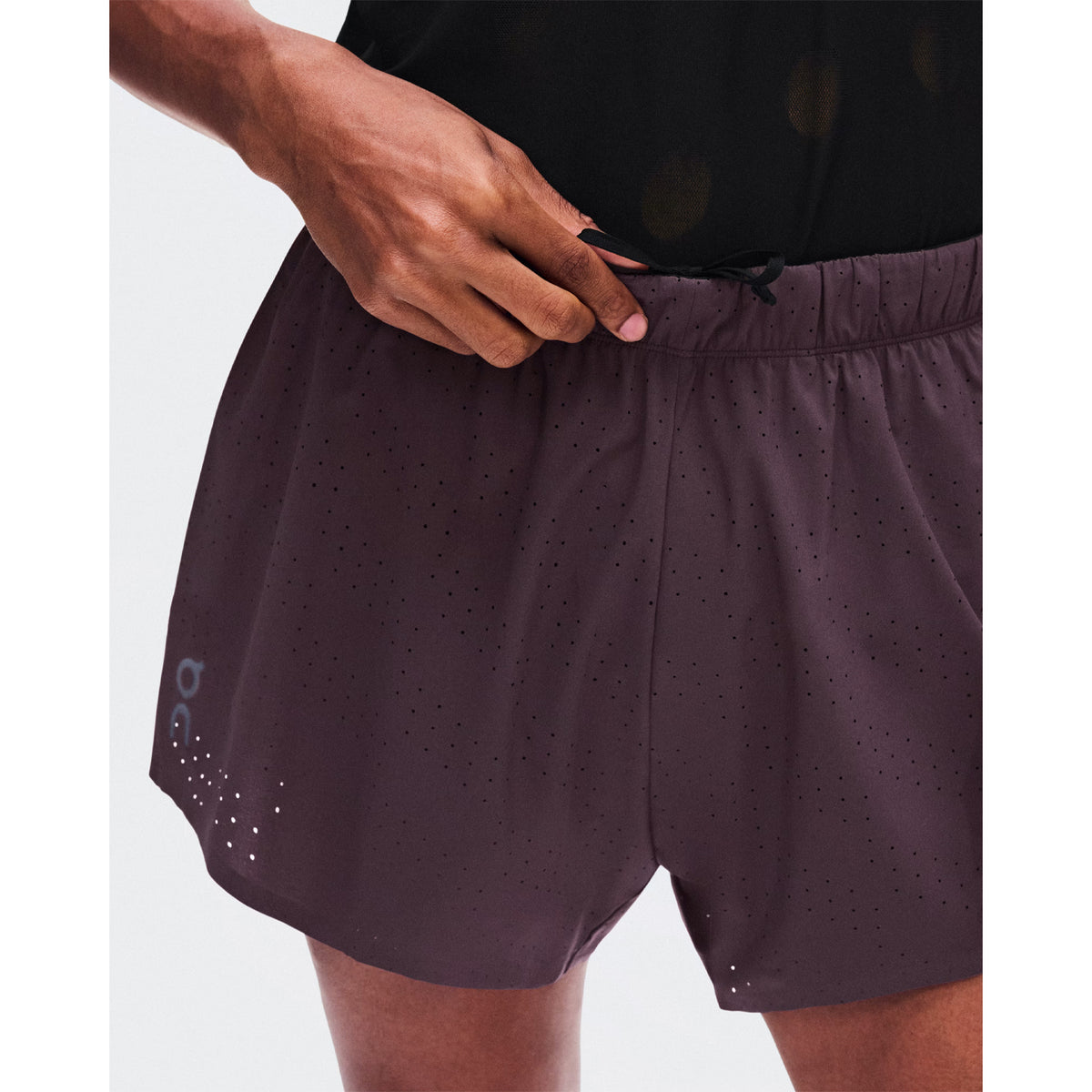 Men's On Zero Shorts Urchin close-up of stretch-woven perforated outer showing ventilation construction for improved airflow during race pace and sustained training efforts