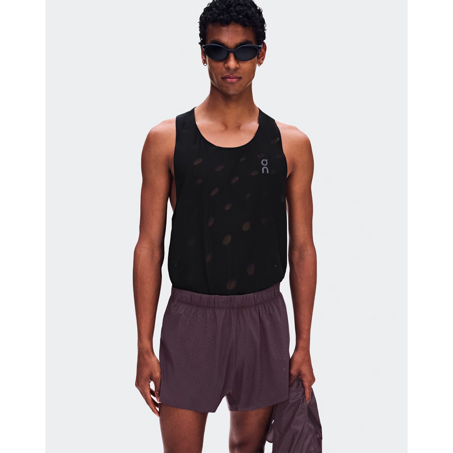 Men's On Zero Shorts Urchin front view on male runner showing lightweight perforated outer with On athlete-inspired graphic and adjustable waistband for race day performance