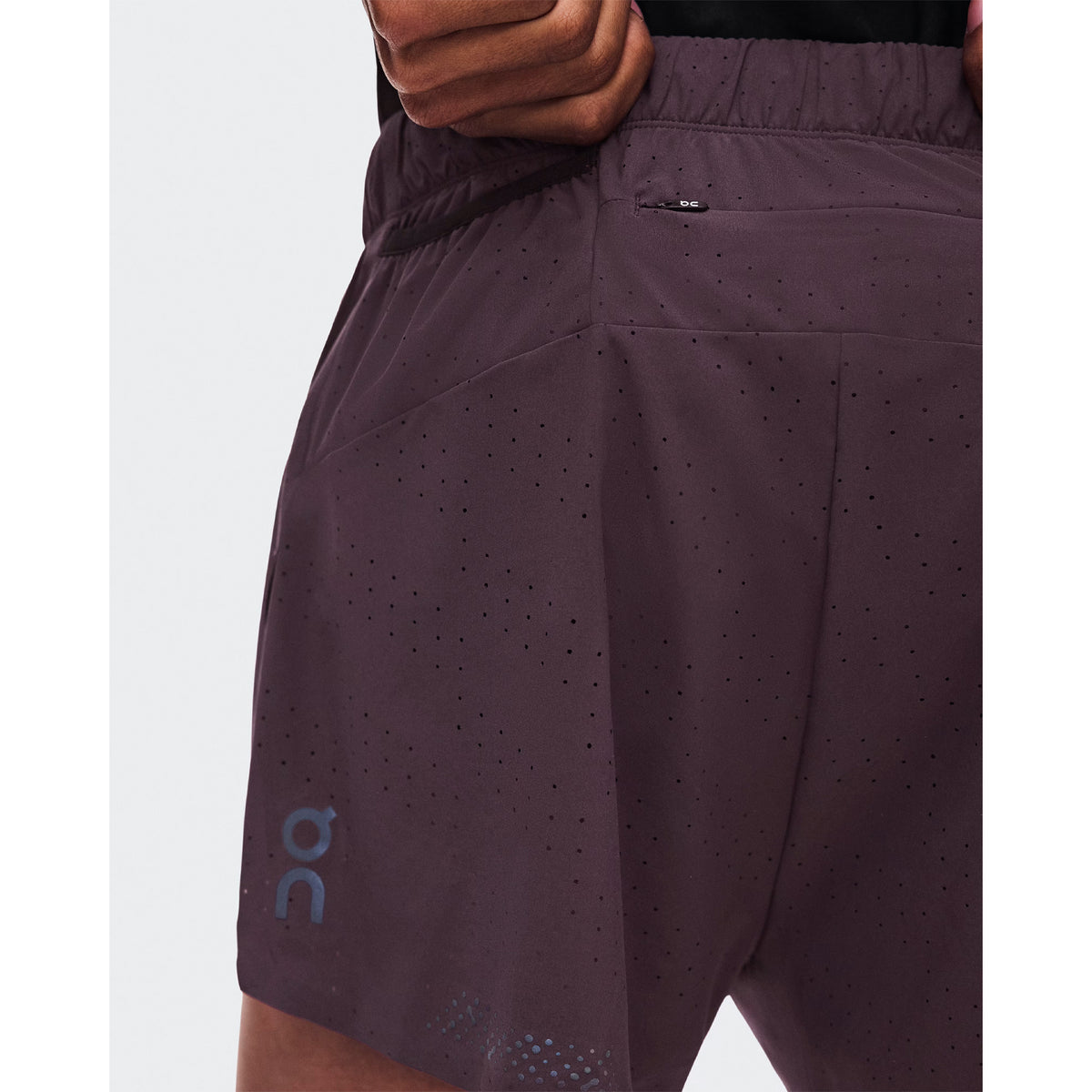 Men's On Zero Shorts Urchin close-up of back showing zip pocket and two gel mesh pockets for accessible race day storage without additional belts or carrying solutions