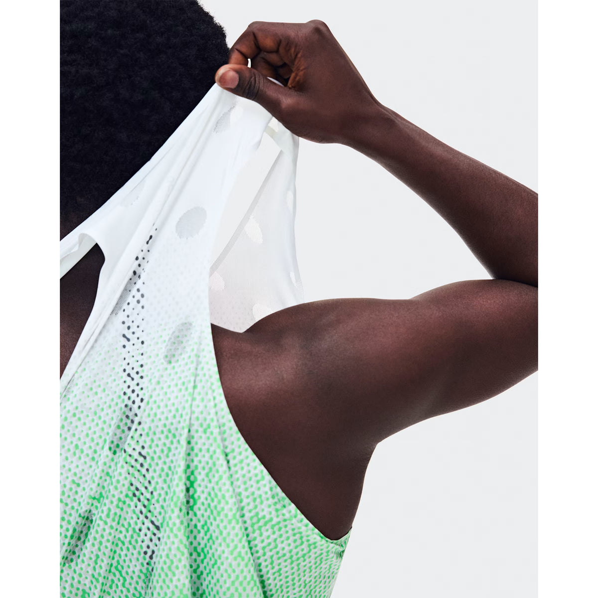 Men's On Zero Tank Breathe Verdite close-up of striking functional jacquard fabric showing On DryTec breathable moisture-wicking construction with minimal seams for ultralight distraction-free racing and training
