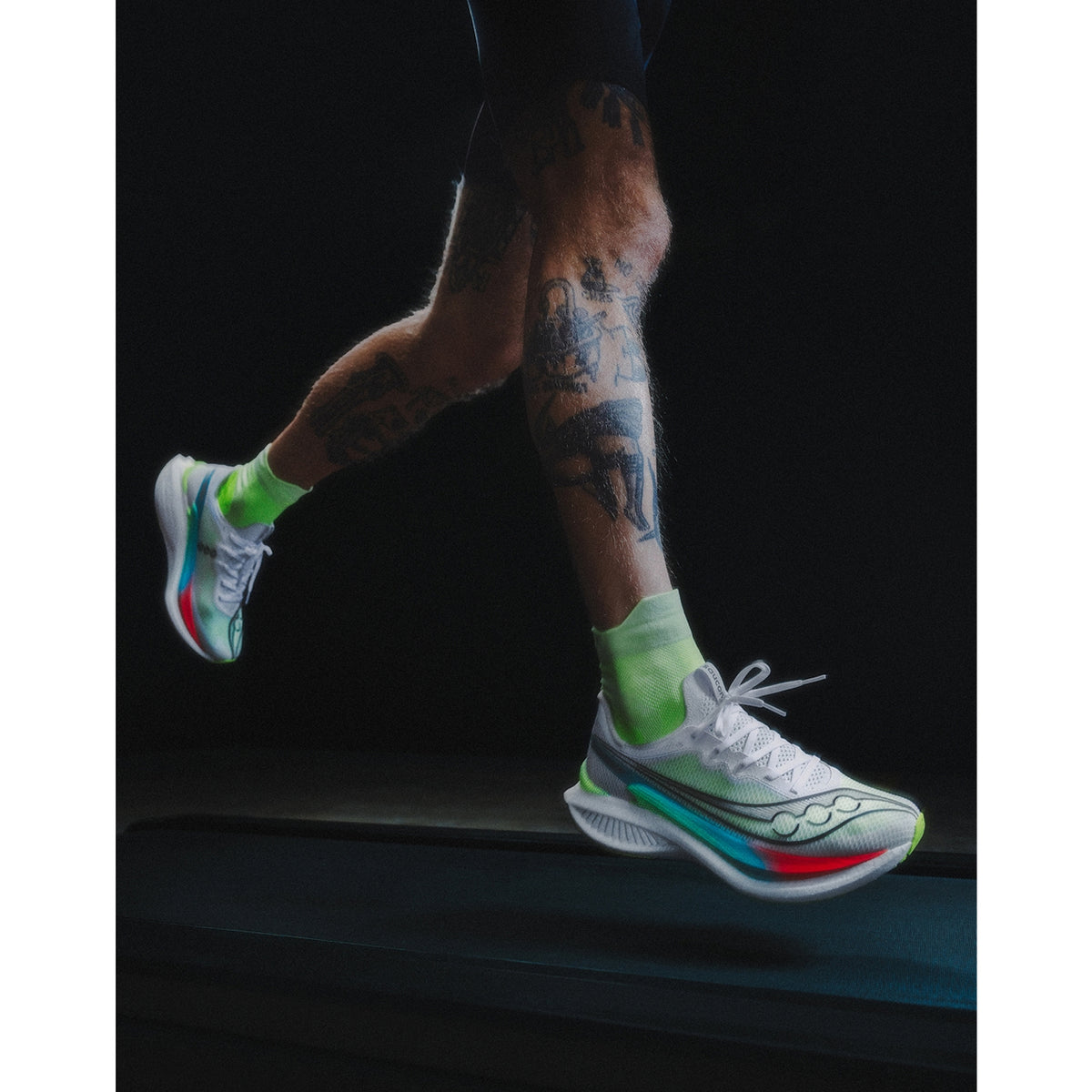 Men's Saucony Endorphin Pro 5 Running Shoes White Multi side view on male runner showing carbon-plated super foam construction with PWRRUN PB and PWRRUN HG layers for race day performance