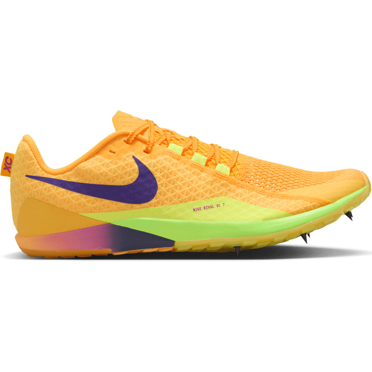 Introducing the Nike Zoom Rival XC 7 Running Spikes in Citron Pulse, Indigo Burst, and Blue Void. These cross-country spikes stand out with a vibrant orange upper accented by a purple Nike logo, a green midsole, neon yellow heel, and an aggressive spike plate on the forefoot for superior traction. Crafted from breathable mesh for maximum comfort, the Zoom Rival XC 7 is engineered to deliver top performance in track and field running competitions.