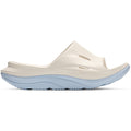 HOKA Ora Recovery Slide 3 Alabaster Ambient Blue outer side view showing dual-density geometry with injection-moulded sugarcane EVA midsole and early stage MetaRocker for post-run recovery comfort