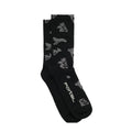 A pair of Portal Ritual Merino Socks in Black Beauty, featuring mid-weight merino wool construction with gray abstract patterns and “Portal” printed in white on the sole, are displayed neatly on a white background.