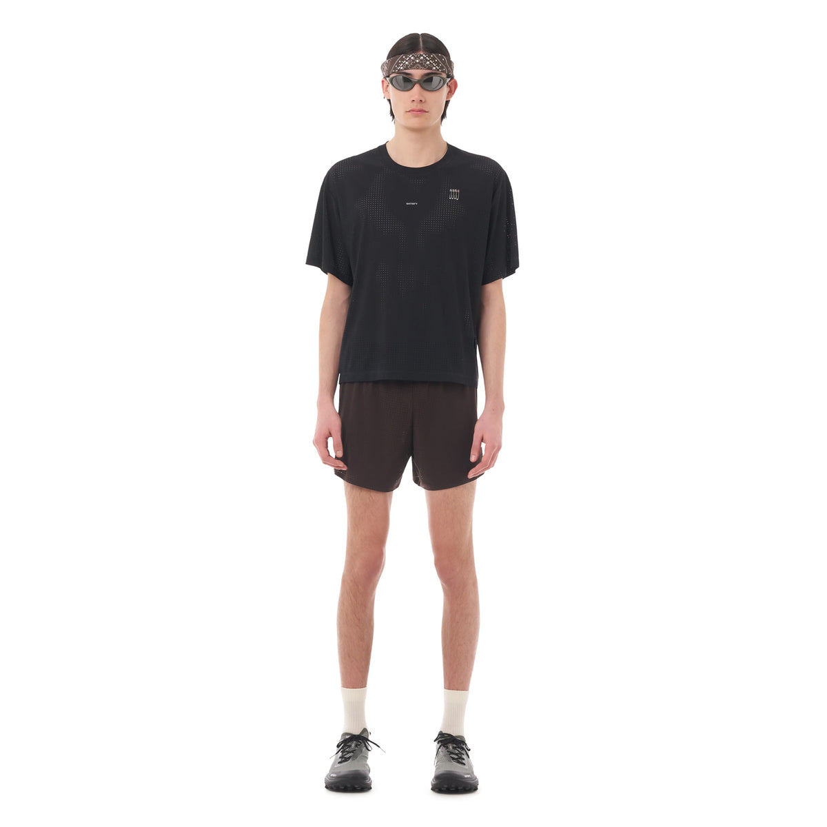 Satisfy Space-O Tee Black full body front view on male runner showing regular fit with precision-punched Space-O micro jersey and four-way stretch construction