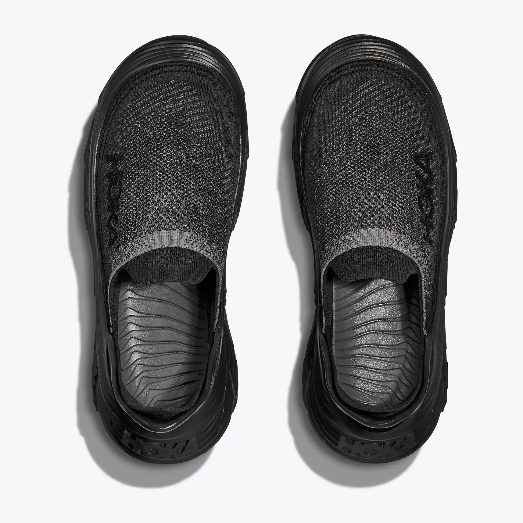Hoka Restore TC Black / Black - Achilles Heel