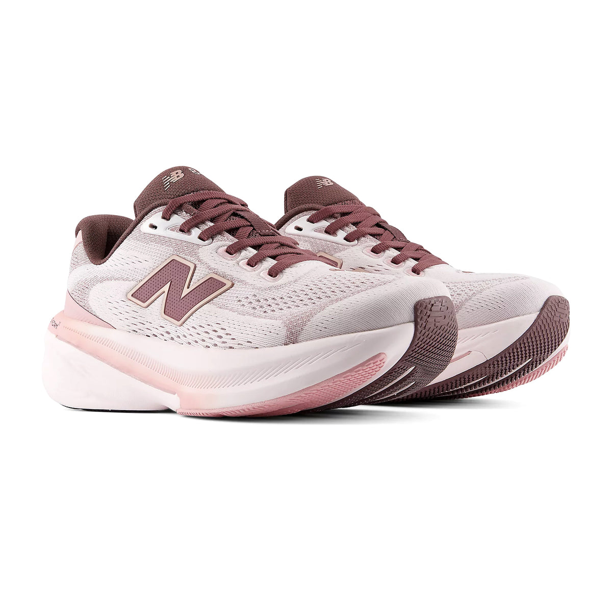 Women's New Balance 860v15 Running Shoes Pink Salt Pebble angled side view of pair showing Fresh Foam X cushioning with Stability Plane technology and rocker profile geometry for reliable stability running