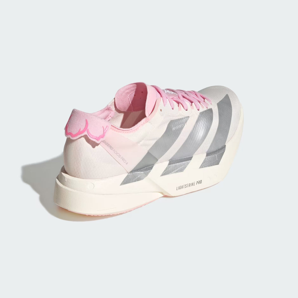 Women's adidas Adizero Adios Pro 4 Running Shoes Core White Silver Metallic Clear Pink heel view showing double-layer LIGHTSTRIKE PRO cushioning stack and carbon ENERGYRODS 2.0