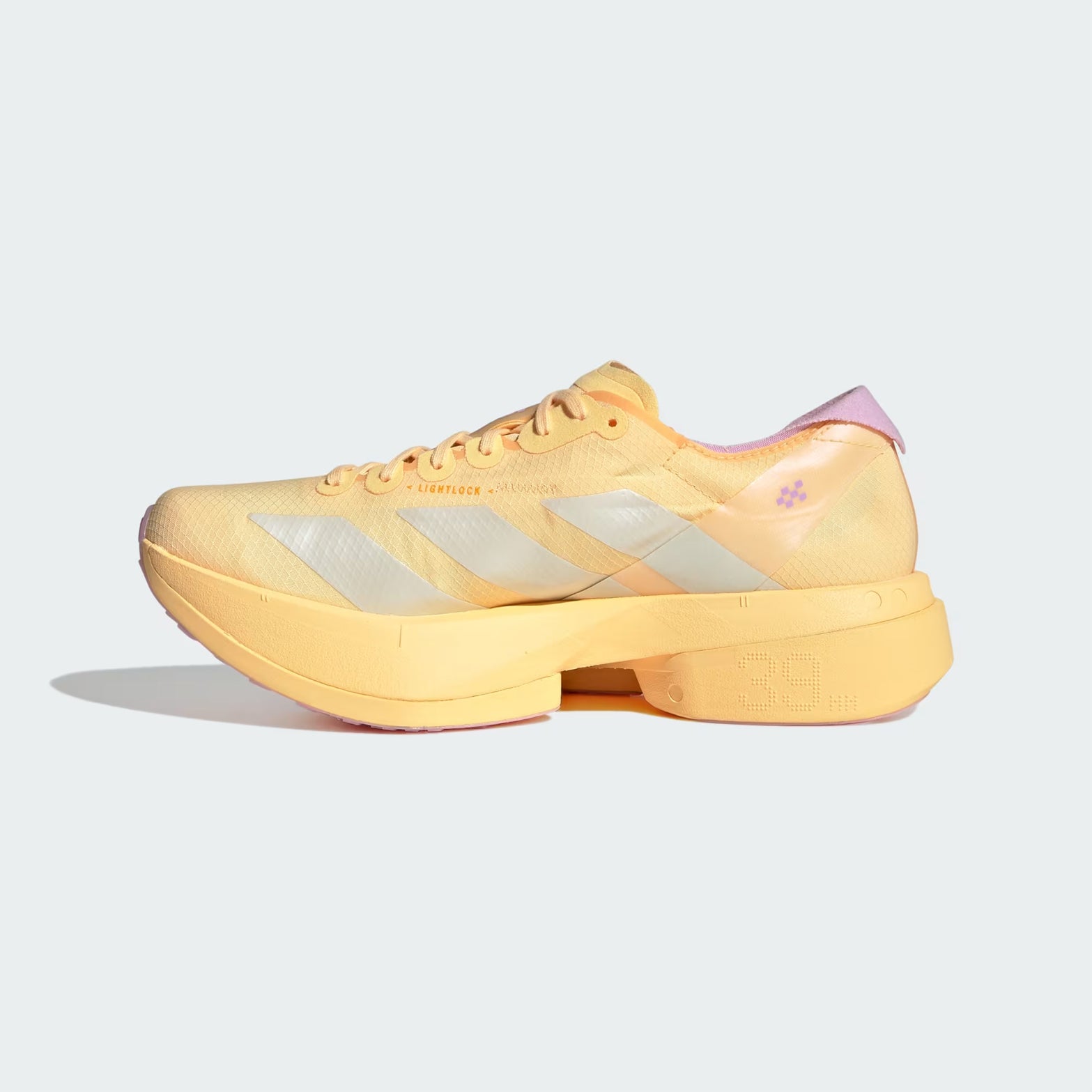 Women's adidas Adizero Adios Pro 4 Running Shoes Orange Pink inner side view showing carbon fibre ENERGYRODS 2.0 and lightweight racing foam