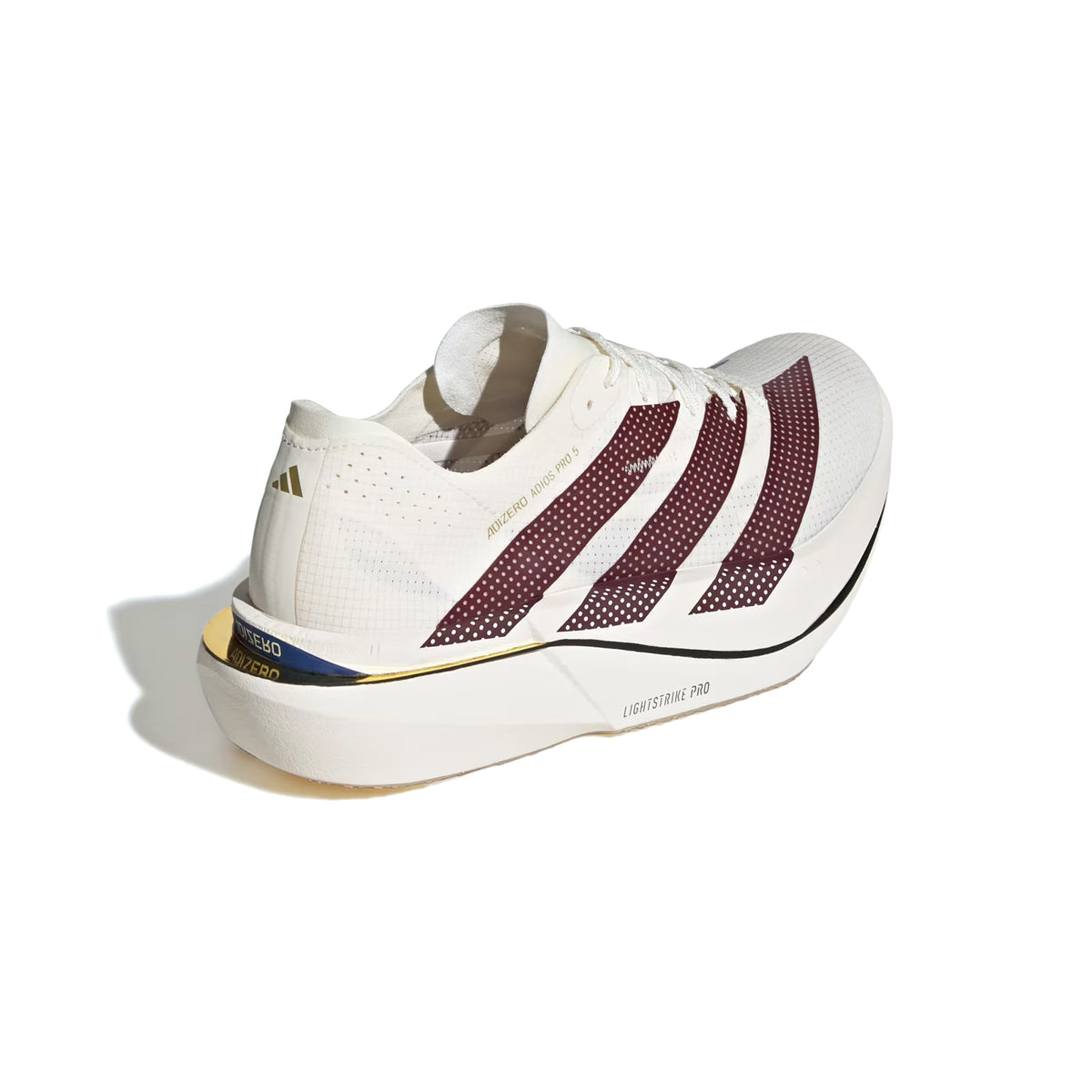 Women’s Adizero Adios Pro 5 Running Shoes in off-white with perforated maroon stripes, a thick, chunky LightstrikePro midsole, and gold and blue heel accents.