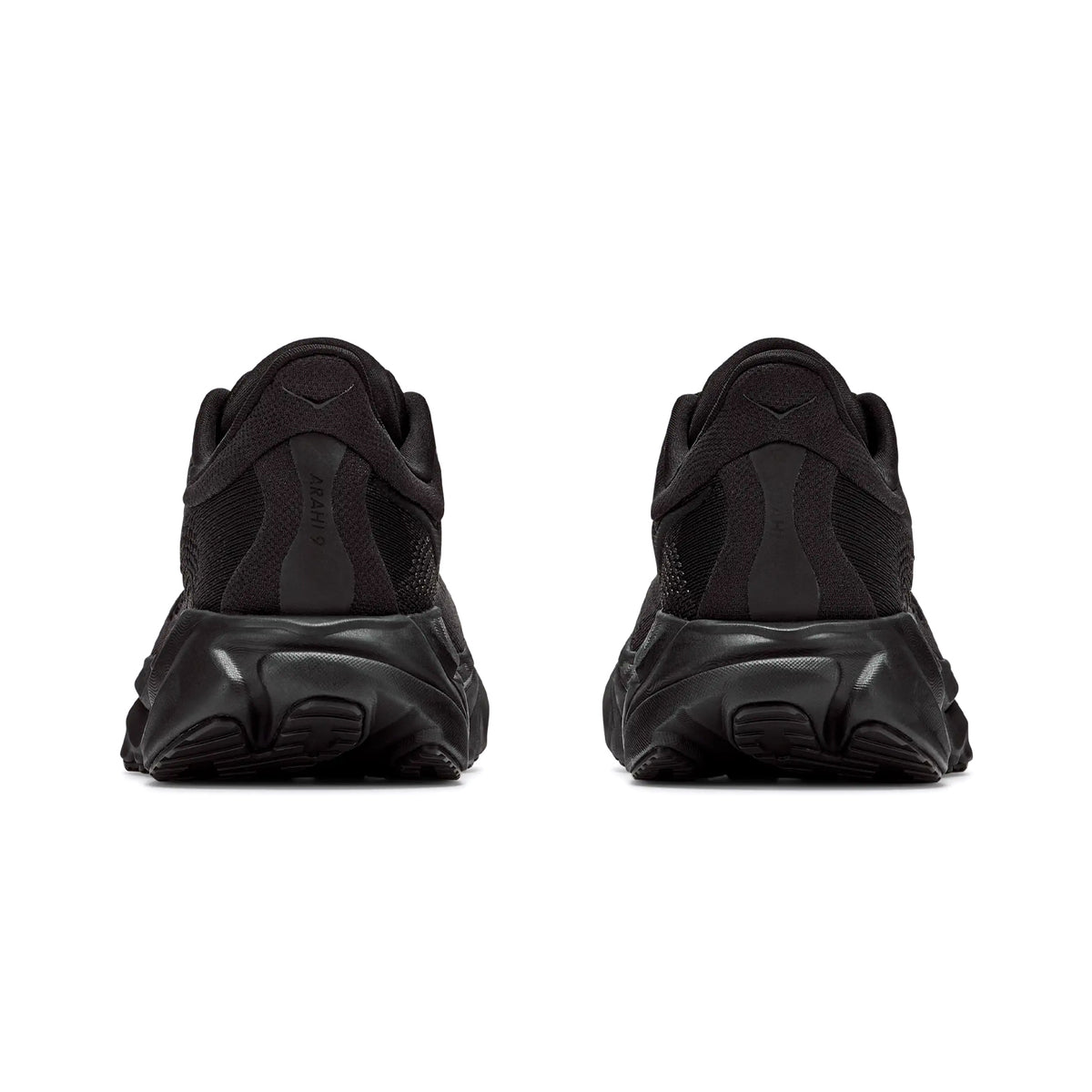 Women's HOKA Arahi 9 Wide Fit Running Shoes Black Black heel view showing dual-density compression moulded EVA foam with H-Frame stability technology and wide fit construction for cloud-like cushioning