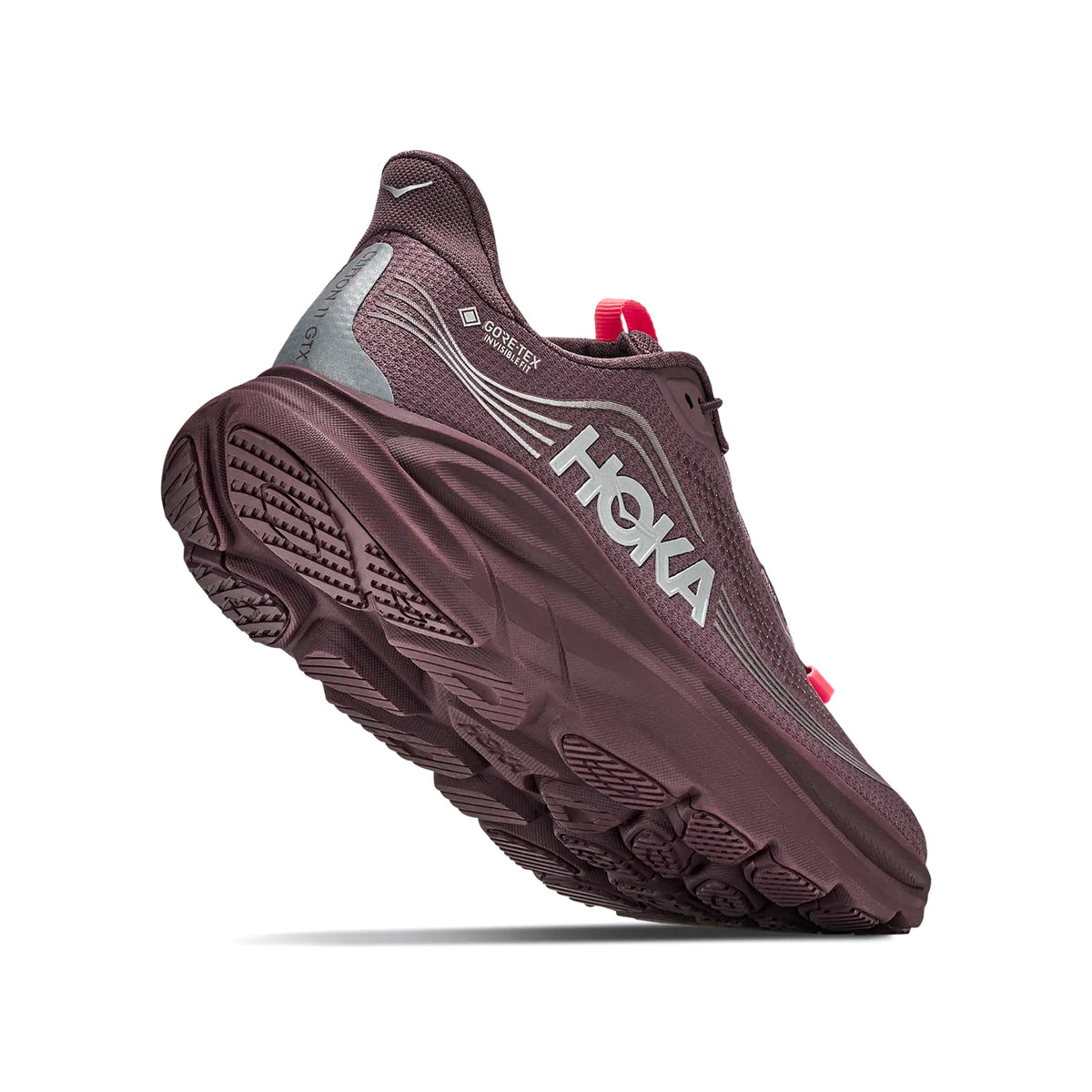 Maroon HOKA running shoe with a thick, textured sole, white logo on the side, and gray and pink accents, viewed from a low rear angle against a white background.