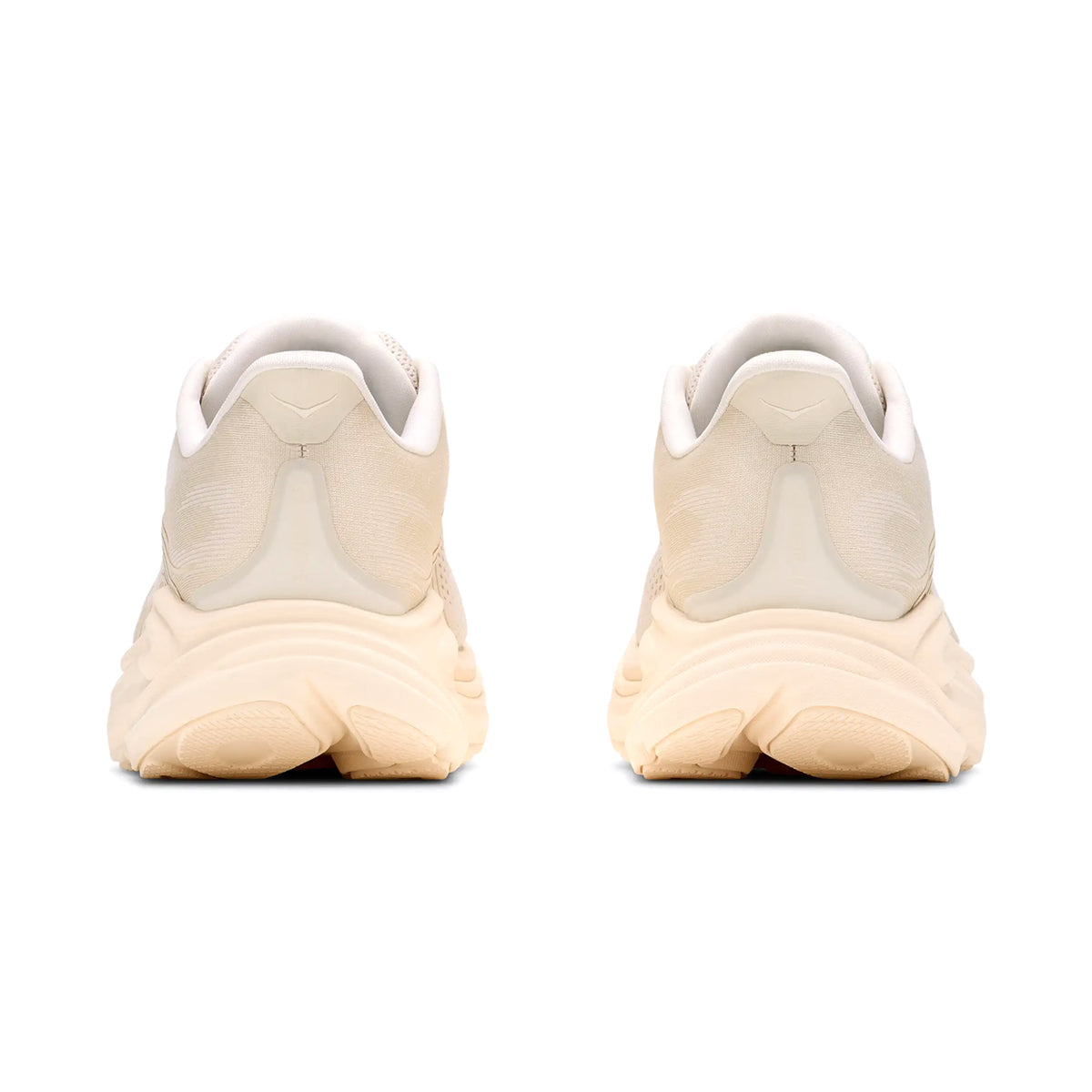 Women's HOKA Clifton 11 Running Shoes Alabaster Oat Milk heel view showing compression moulded EVA foam with Active Foot Frame for supportive plush landings during road running