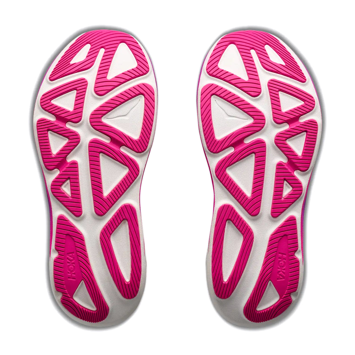Two sneaker soles facing up, featuring a white base with vibrant pink geometric patterns and textured tread areas for enhanced grip. The shoes are symmetrical and display the Hoka brand name on the heel area of each sole, exemplifying the innovative design elements found in the Women’s Clifton Pro Running Shoes in Carbon Black / Cosmic Purple from Hoka’s PROGLIDE+ series.