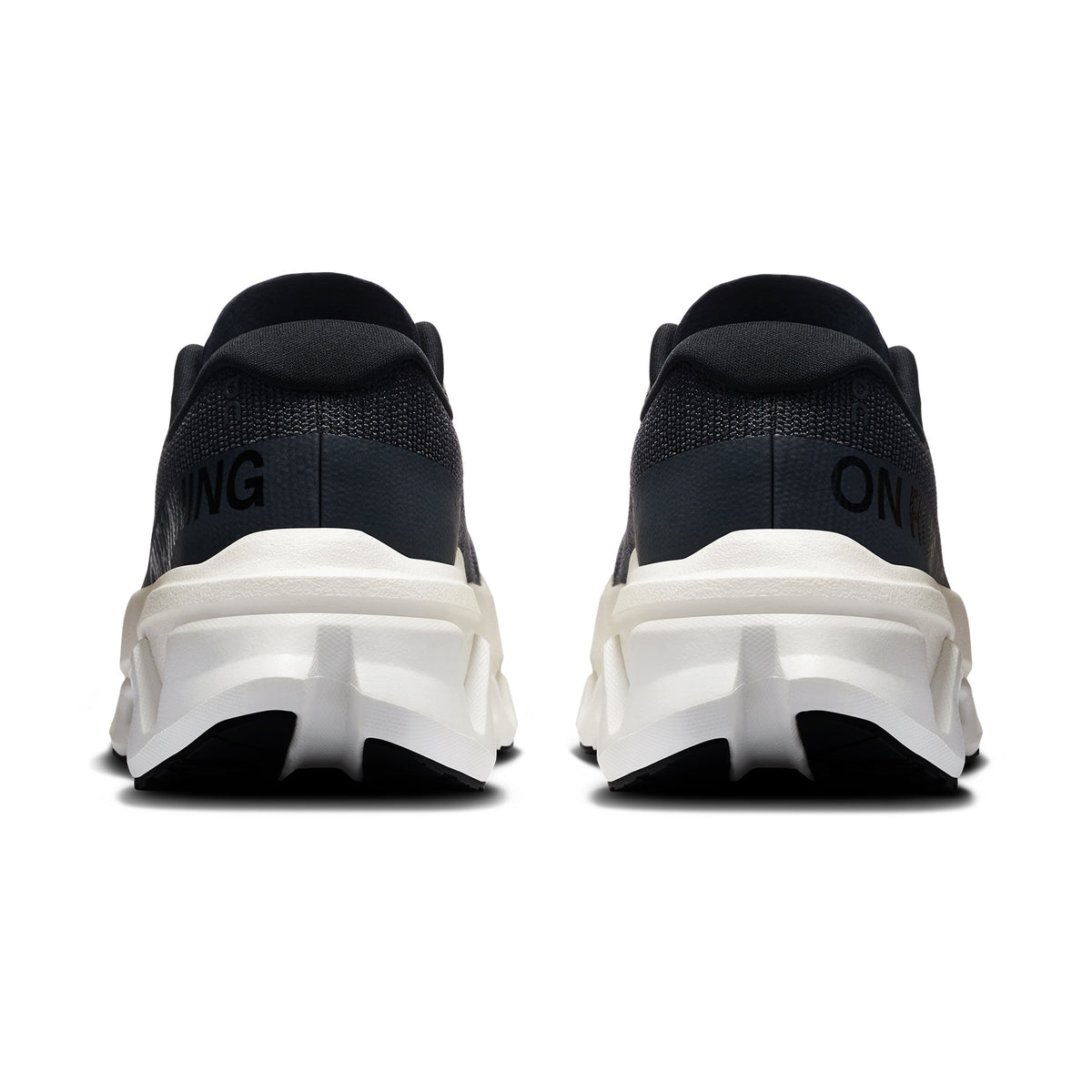 Women's On Cloudmonster 3 Hyper Running Shoes Black Ivory heel view showing re-engineered heel construction and dual-layer Helion foam stack