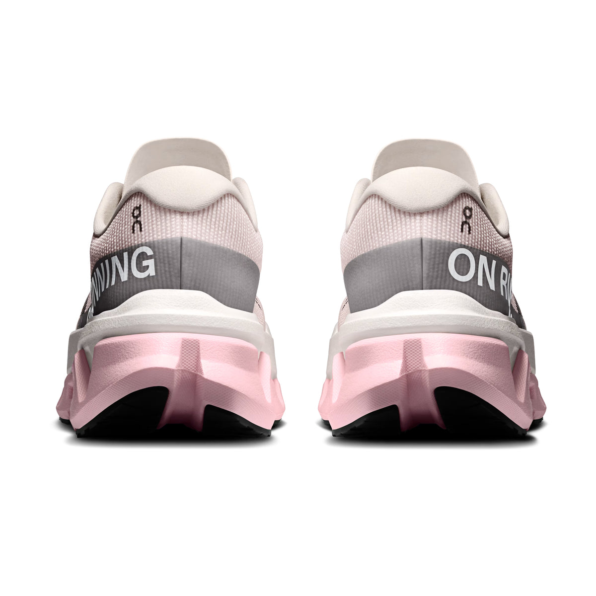 On Cloudmonster 3 Hyper women's running shoe in Ivory / Peony — heel view showing enhanced rocker heel geometry, padded collar and peony triple-layer CloudTec® midsole contrast