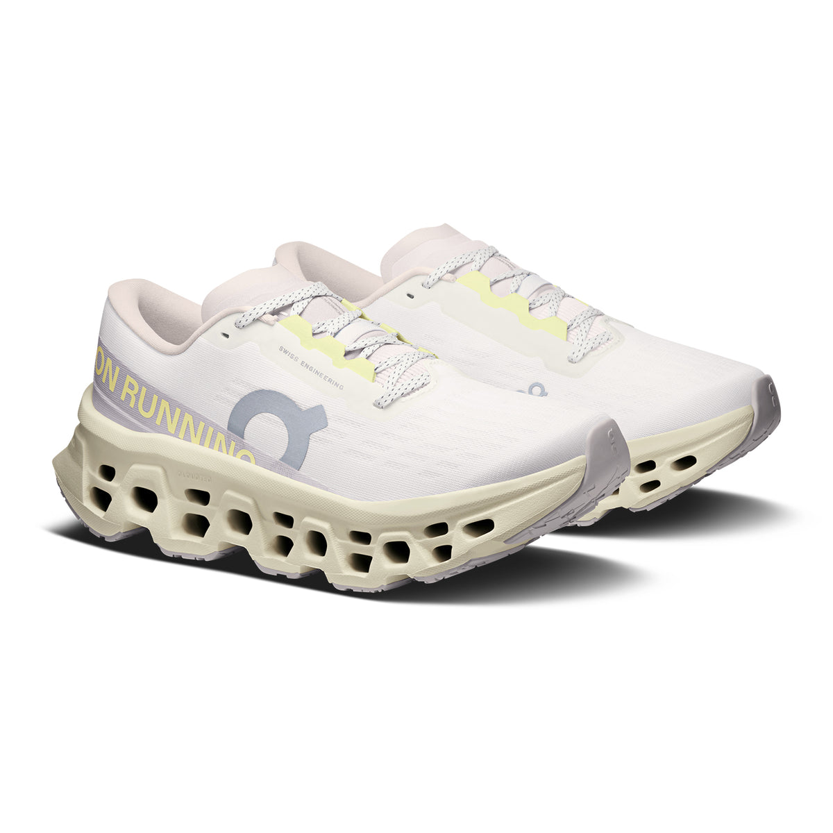 On Cloudmonster 3 women's running shoe in Ivory / Seedling — angled side view showing ivory upper, CloudTec® midsole geometry and seedling green accent detailing