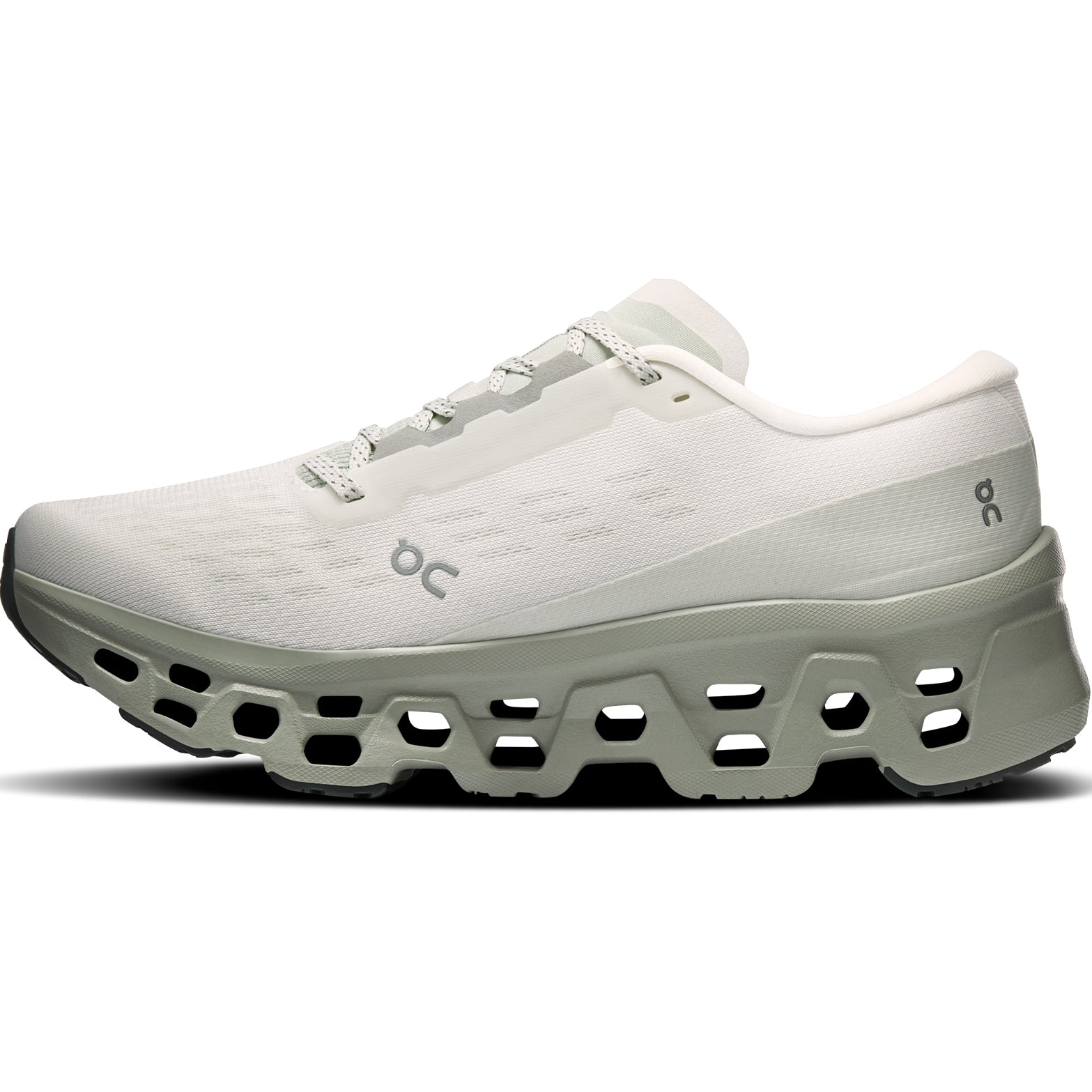 On Cloudmonster 3 women's running shoe in Ivory / Tin — inner view showing ivory engineered knit upper, tin grey Helion™ foam midsole detailing and compressed rubber outsole construction