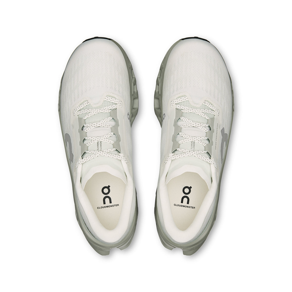 On Cloudmonster 3 women's running shoe in Ivory / Tin — top-down view showing ivory engineered knit upper with breathability zones, enhanced tongue construction and lace closure with tin grey detailing