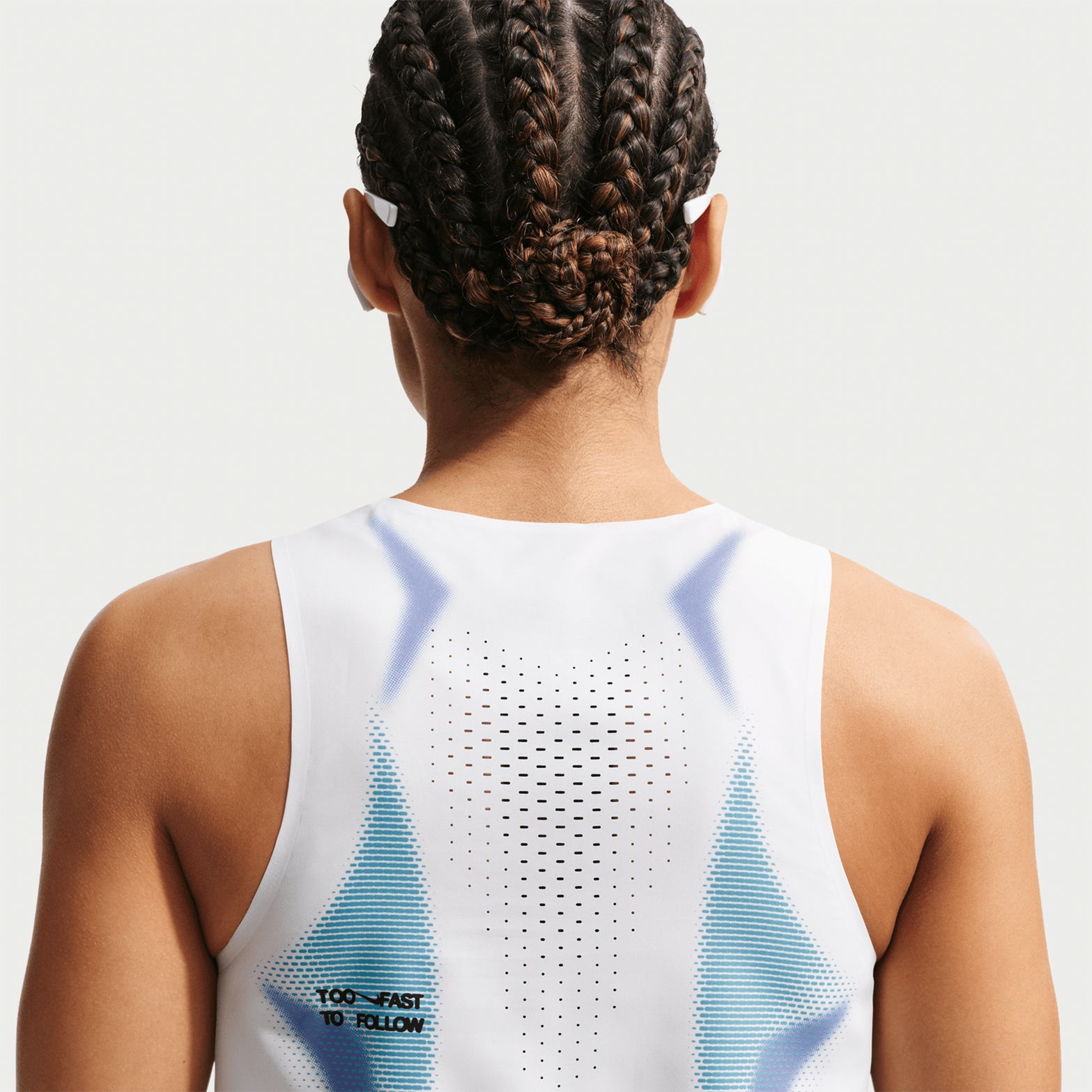 Women's Nike Dri-FIT ADV Cropped Running Vest White Black Black back view on female runner showing breathable construction with moisture management for training and racing