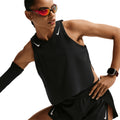 Women's Nike Dri-FIT Aeroswift ADV Cropped Running Tank Black White front view on female runner showing cropped design with Dri-FIT ADV moisture-wicking for breathable race day performance