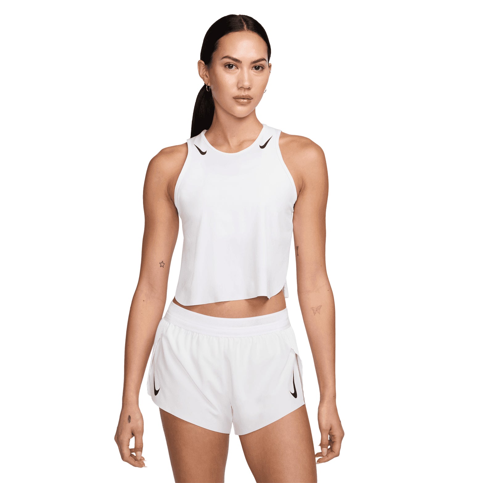 Women's Nike Dri-FIT AeroSwift ADV Running Tank White Black front view on female runner showing cropped design and slim-fitting construction