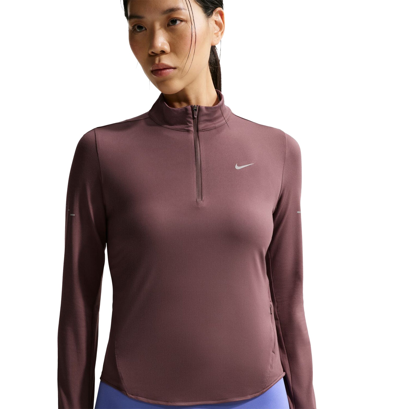 Nike Swift women's Dri-FIT UV 1/4-zip running top in Tattoo front closeup on model showing raglan sleeves and reflective Swoosh logo
