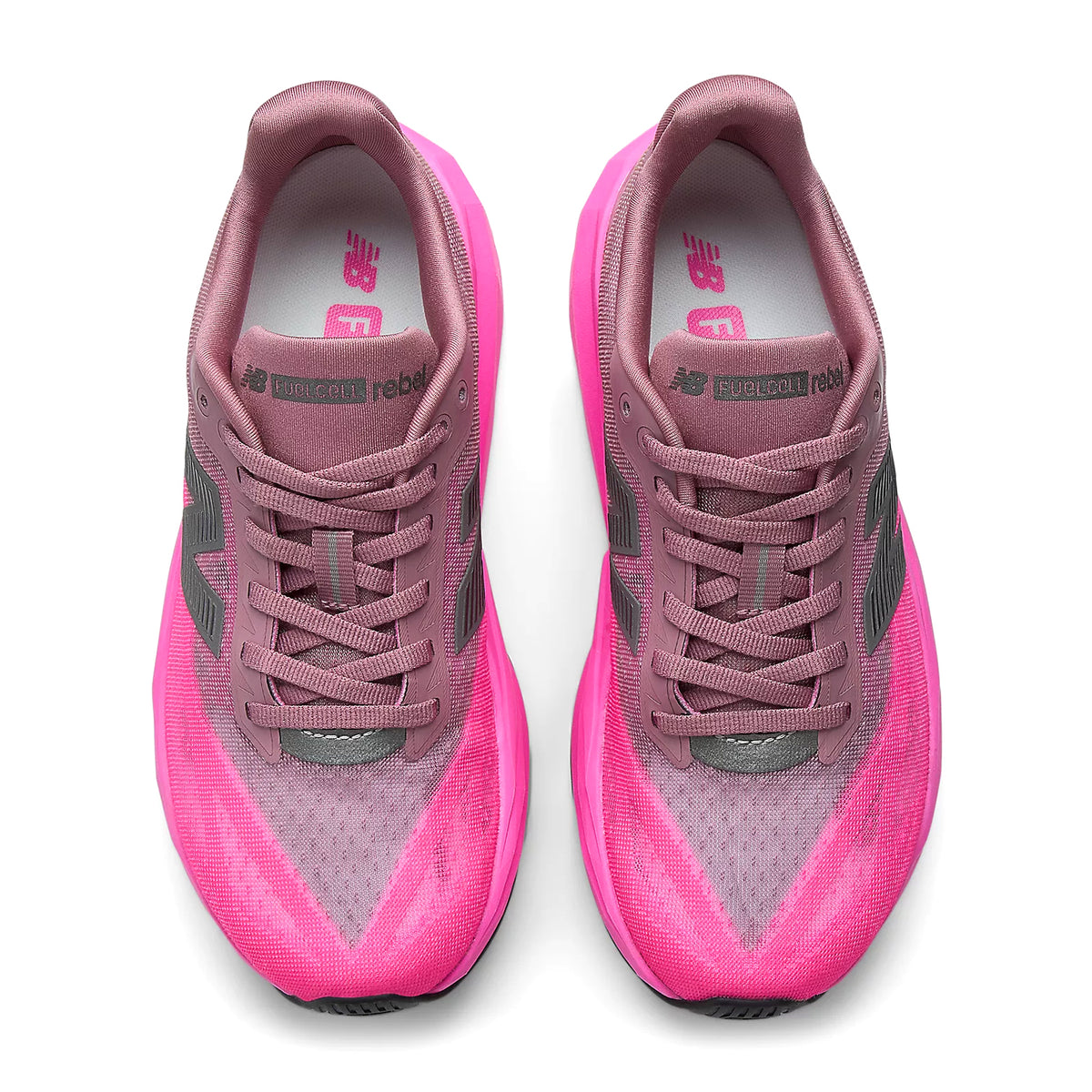 New Balance FuelCell Rebel v5 women's running shoe in Pink Heat / Rosewood — top-down view showing pink heat race-inspired mesh upper construction, redesigned tongue and lace closure with rosewood detailing