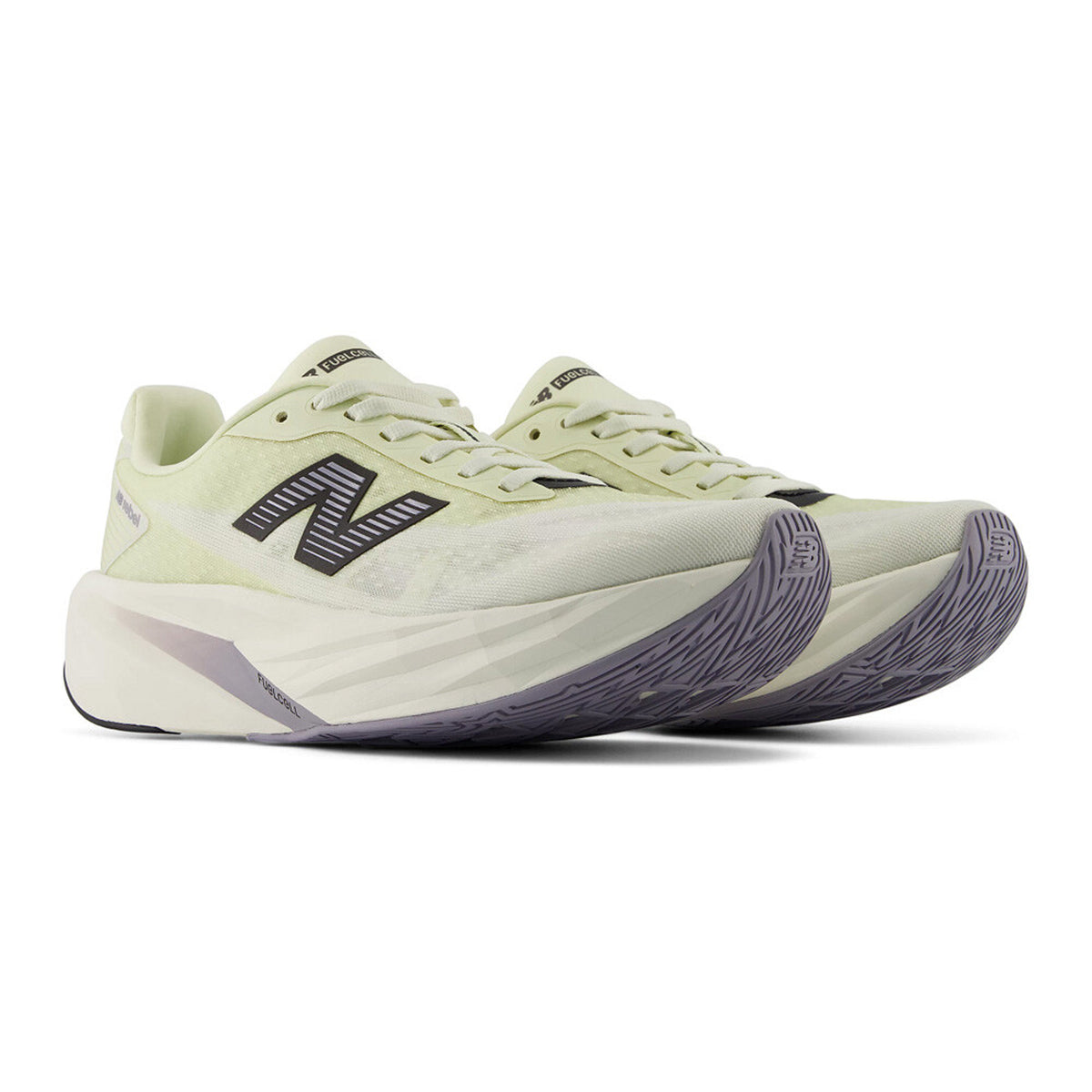 Women's New Balance FuelCell Rebel v5 Running Shoes Pistachio Butter Sea Salt angled side view of pair showing FuelCell PEBA and EVA foam with wider higher geometric midsole stack and redesigned outsole for lightweight propulsive versatile training