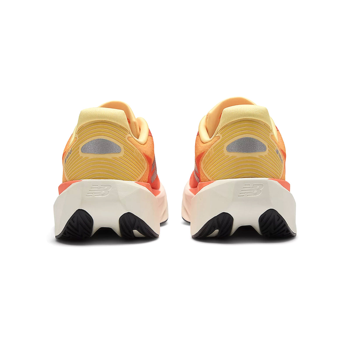 Women's New Balance FuelCell Rebel v5 Running Shoes Orange Grey heel view showing FuelCell midsole stack height, geometric design and redesigned heel construction