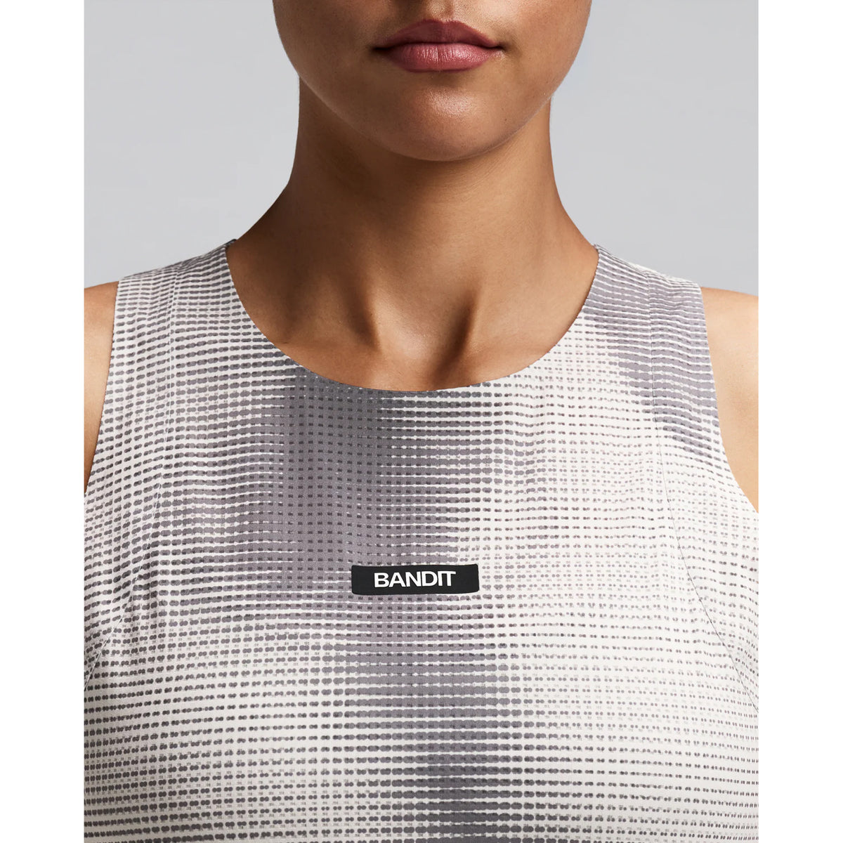 Women's Bandit GeoMesh Race Singlet Slate Plaster close-up of front showing GeoMesh performance knit with bonded neckline finishing and ultra-breathable four-way stretch construction
