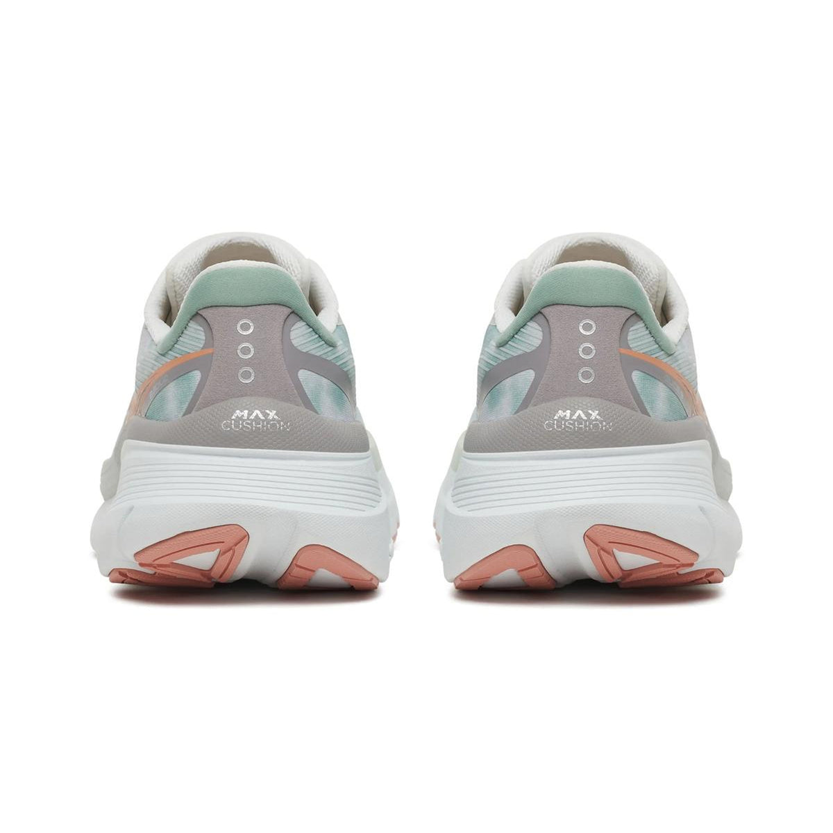 A pair of Women’s Guide 19 Running Shoes Verde viewed from the back, showcasing a blend of white, gray, mint green, and peach accents with thick cushioned soles featuring visible MAX CUSHIONING text on each heel—designed for maximum cushioning and guided support on every stride.