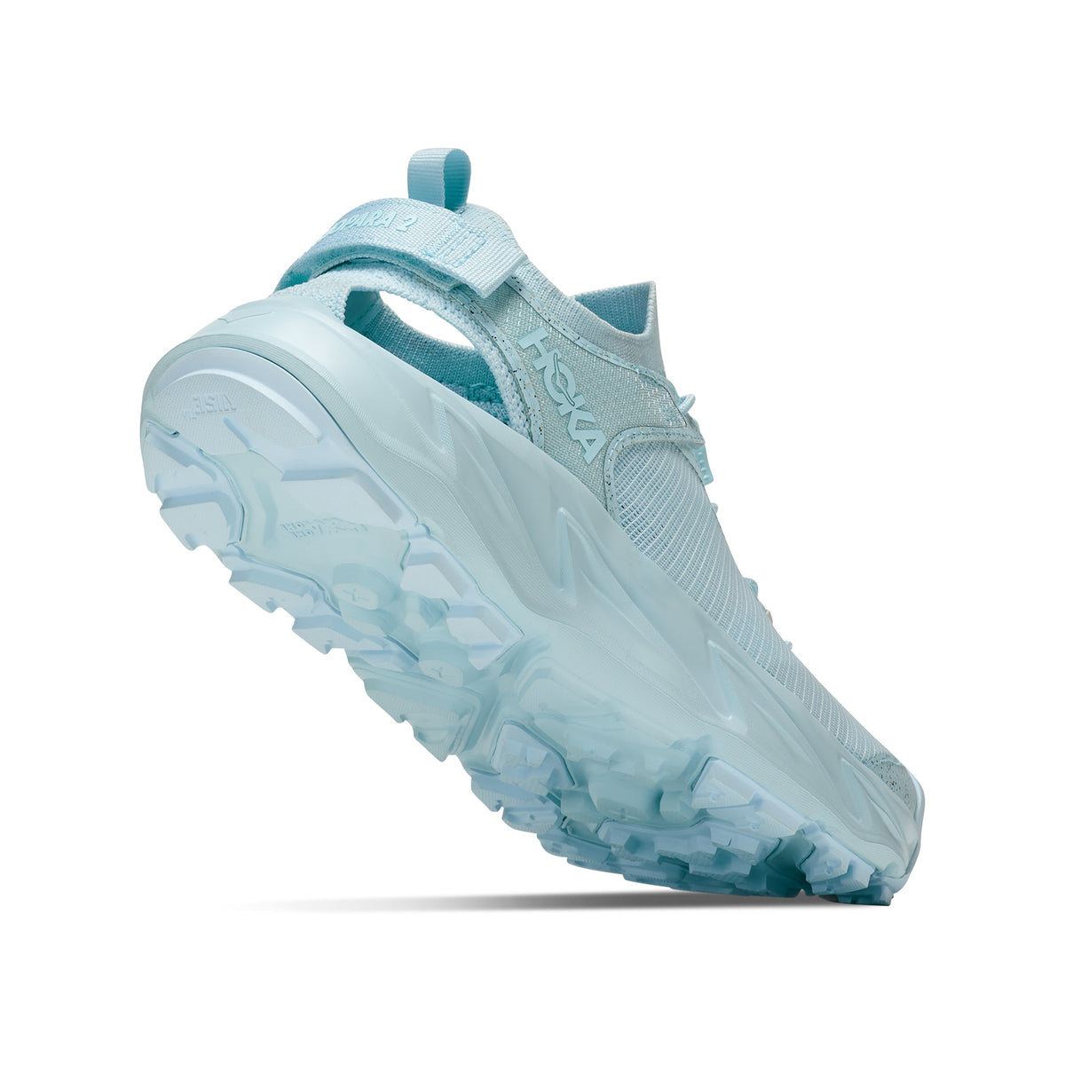 Women's HOKA Hopara 2 Sandal Glimmering Blue Glimmering Blue angled side and heel view showing recycled knit upper with sugarcane EVA midsole, sticky rubber outsole and adjustable heel strap for mixed terrain and water crossings