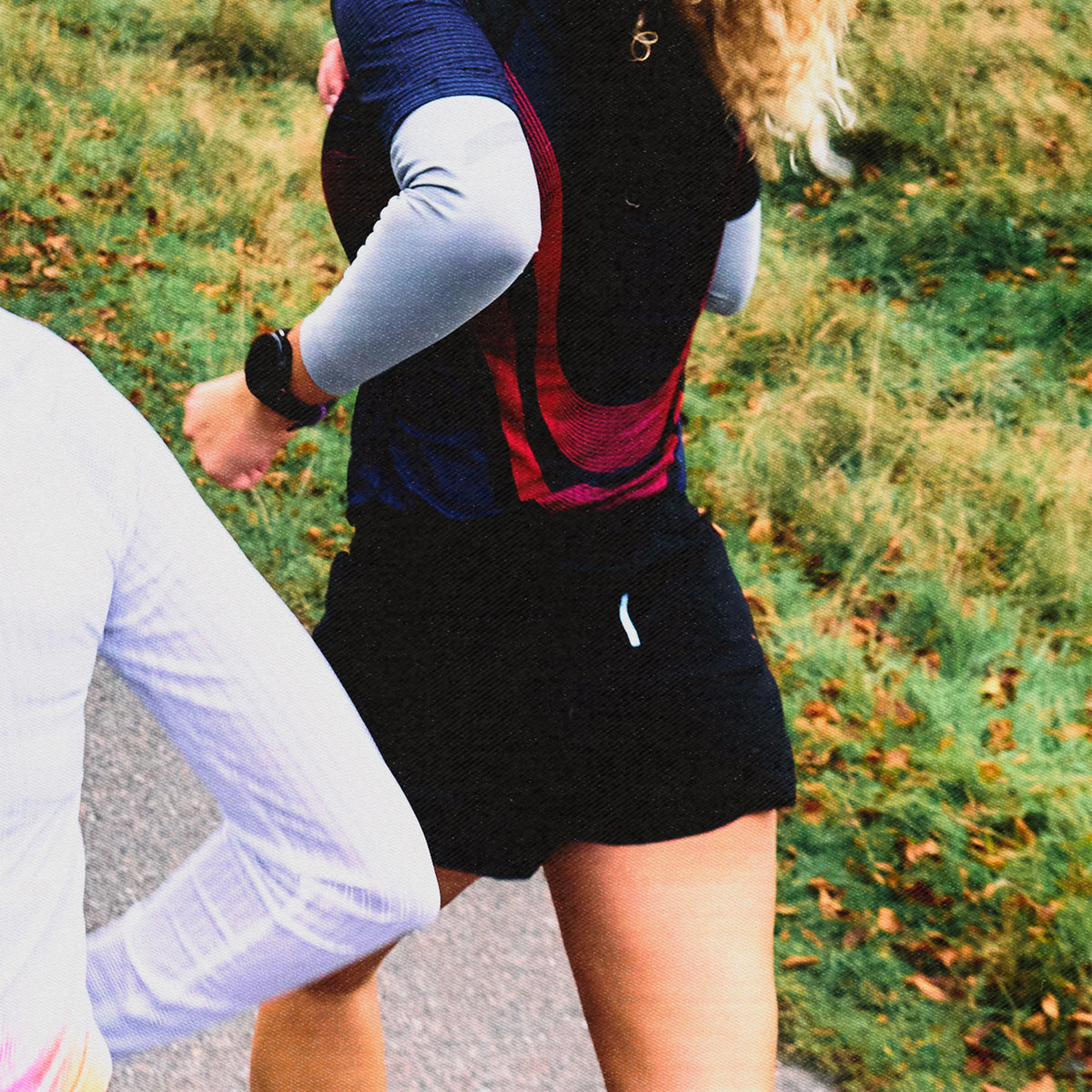 Women's Soar Marathon Shorts worn by female runner in motion showing stretch mesh fit and fuelling storage during running