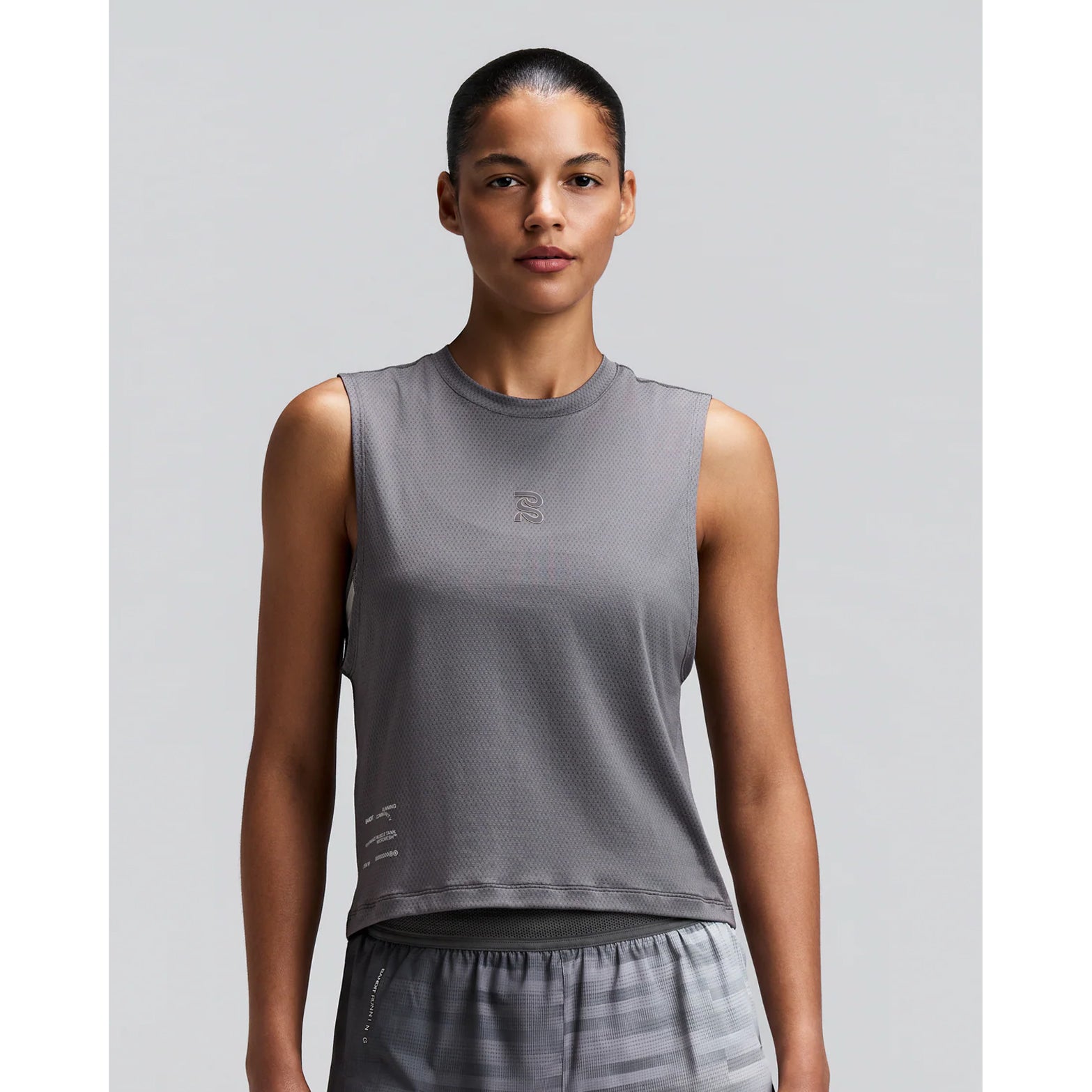 Women's Bandit Micromesh Run Tank Slate front view on female runner showing comfortable tank fit with breathable Micromesh construction for running and training