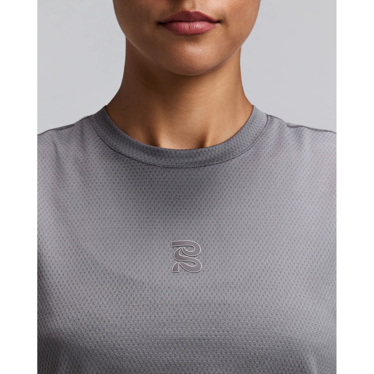 Women's Bandit Micromesh Run Tank Slate close-up of front showing subtle two-tone Bandit logo branding with ultra-breathable Micromesh fabric and Oeko-Tex certified BPA-free construction