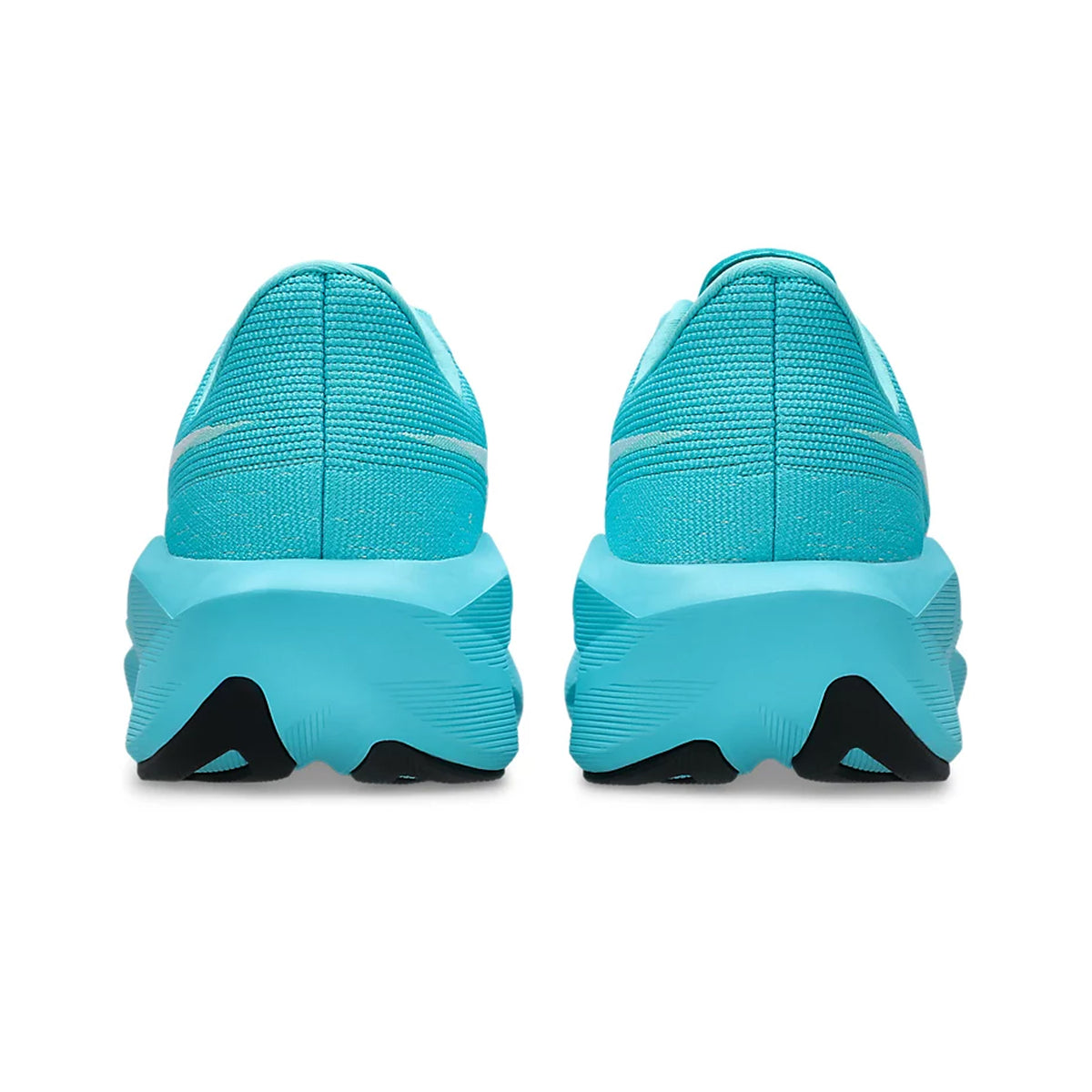 A pair of Women’s Novablast 6 Running Shoes in Energy Aqua / White is shown from the back, featuring thick, textured soles with black accents on the bottoms designed for enhanced energy return.