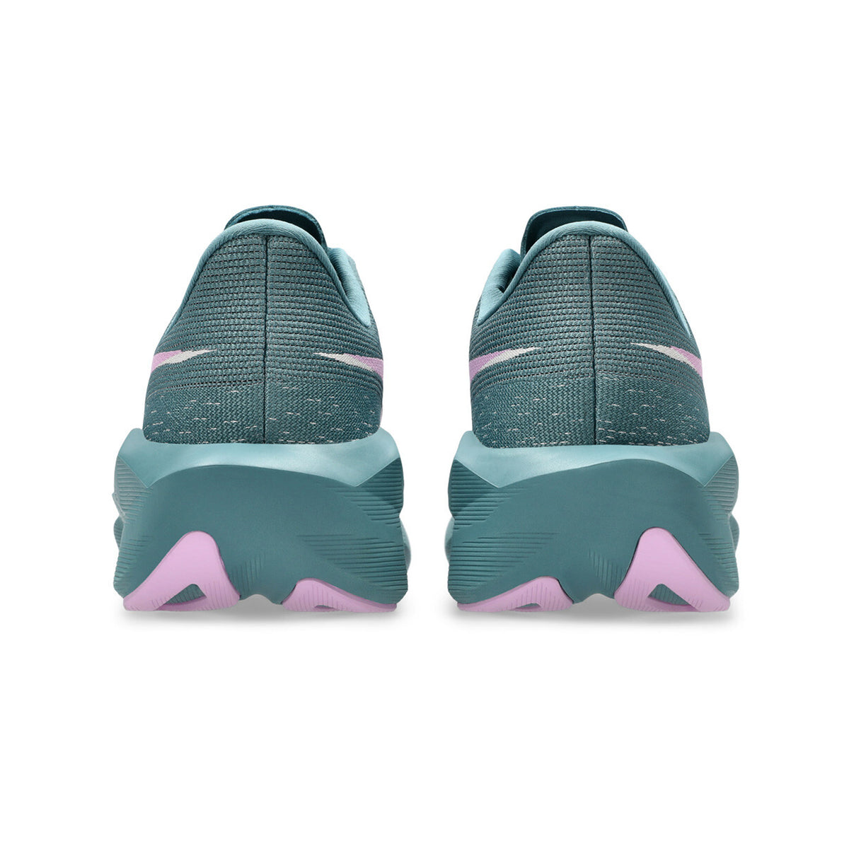 A pair of Women’s Novablast 6 Running Shoes in Foggy Teal / Hazy Lilac, viewed from the back. The thick soles with FF BLAST MAX cushioning provide extra comfort and are teal with hazy lilac accents, while the textured uppers feature a stylish pink swoosh design.