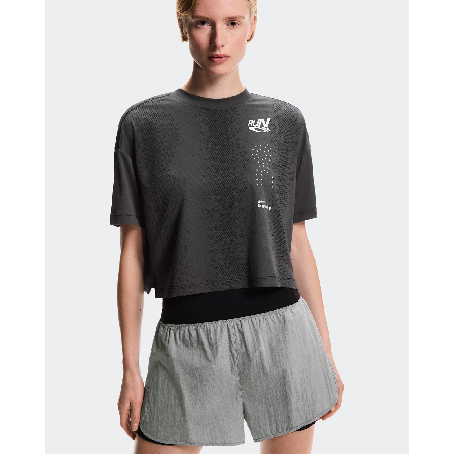 Women's On Performance Volt Shorts Glacier front view on female runner showing lightweight iridescent outer fabric with moisture-wicking On DryTec inner layer