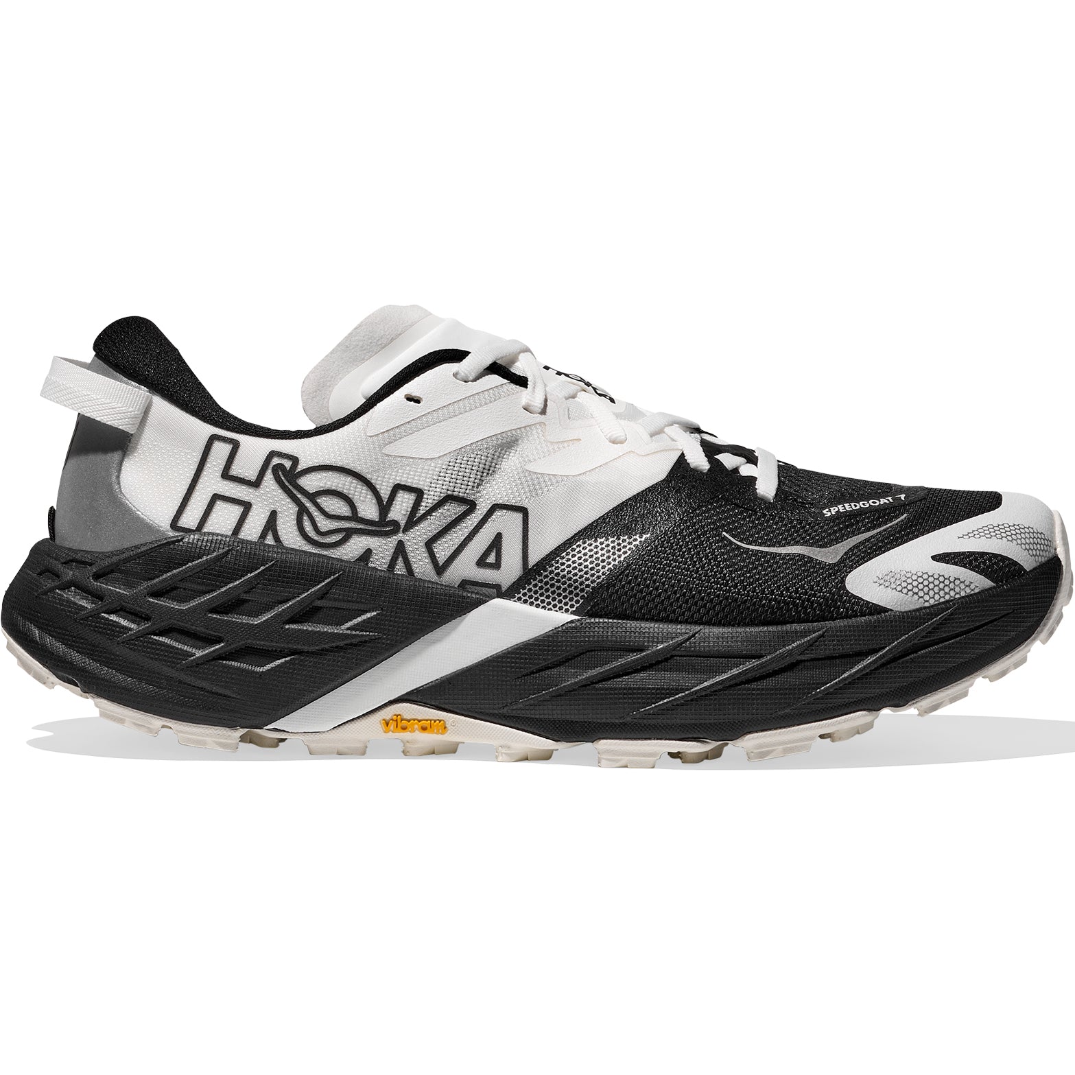Women's Speedgoat 7 Wide Fit Trail Running Shoes Black White outer side view showing Vibram® Megagrip outsole