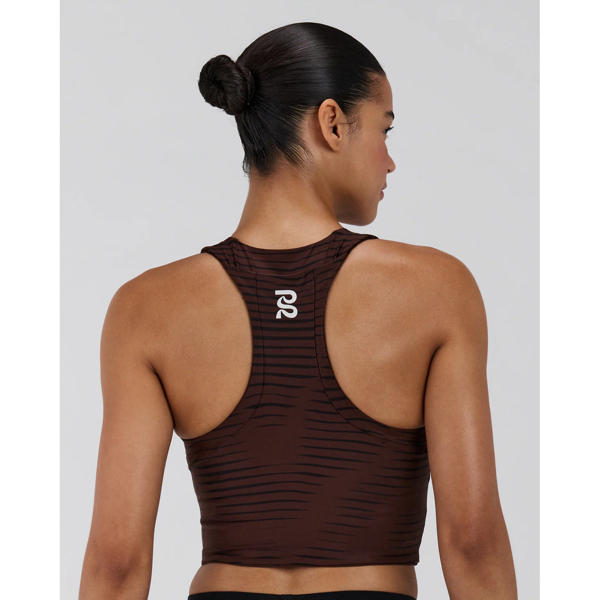 Women's Bandit Stamina Race Crop Organic Stripe Cacao back view showing award-winning Stamina fabric with smooth chafe-free seams and gel storage pockets