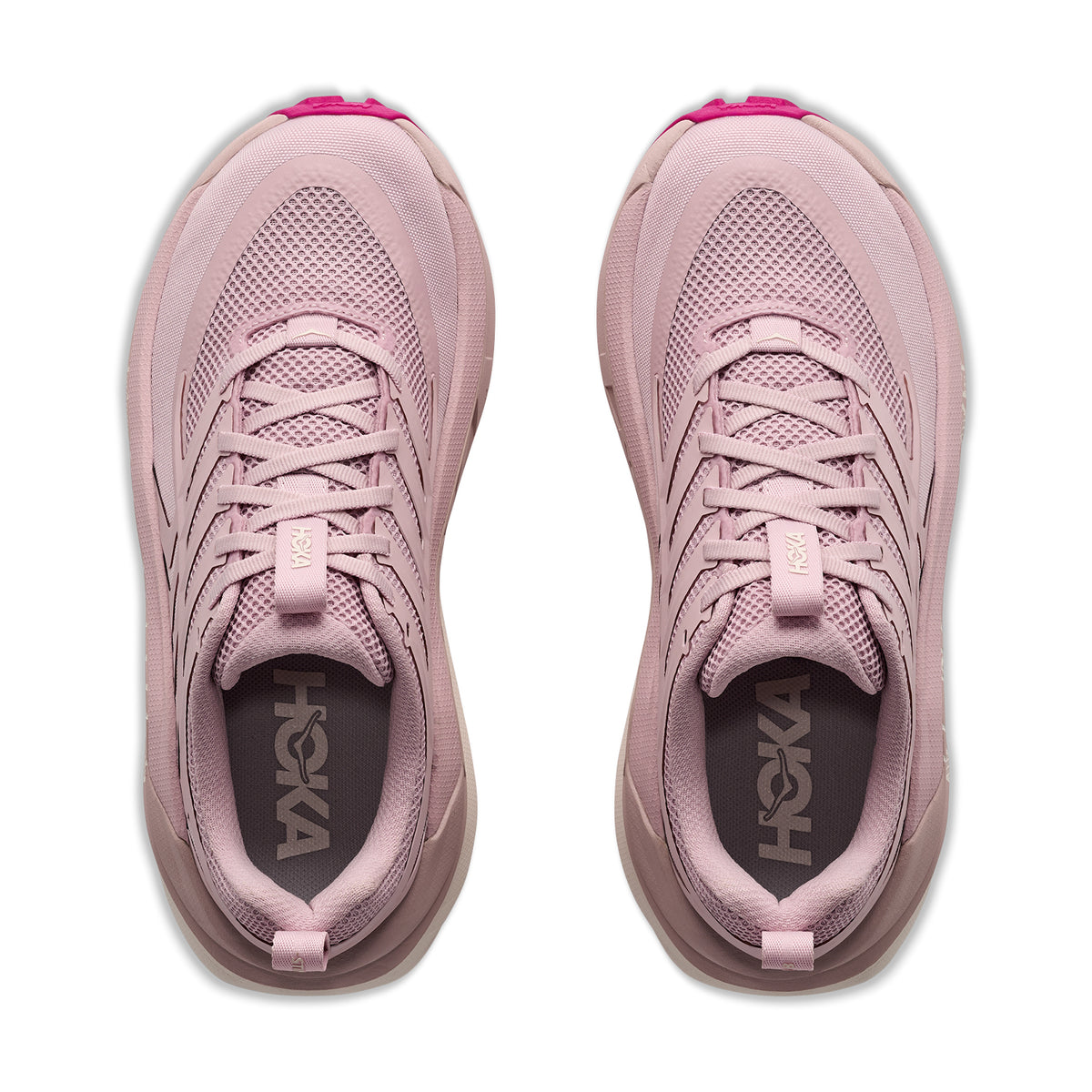 A pair of Hoka Women’s Stinson 8 Trail Running Shoes in Pink Opal / Alabaster seen from above, featuring mesh uppers, laces, and the Hoka logo on the insoles. Designed with H-Frame stability, these shoes deliver comfort and support for every adventure.