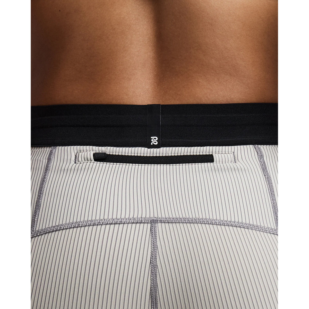 Women's Bandit Striped Cadence 5 Inch Compression Shorts Plaster Slate close-up of back showing back zipper pocket with grip tape hem technology and subtle silicone logo detailing