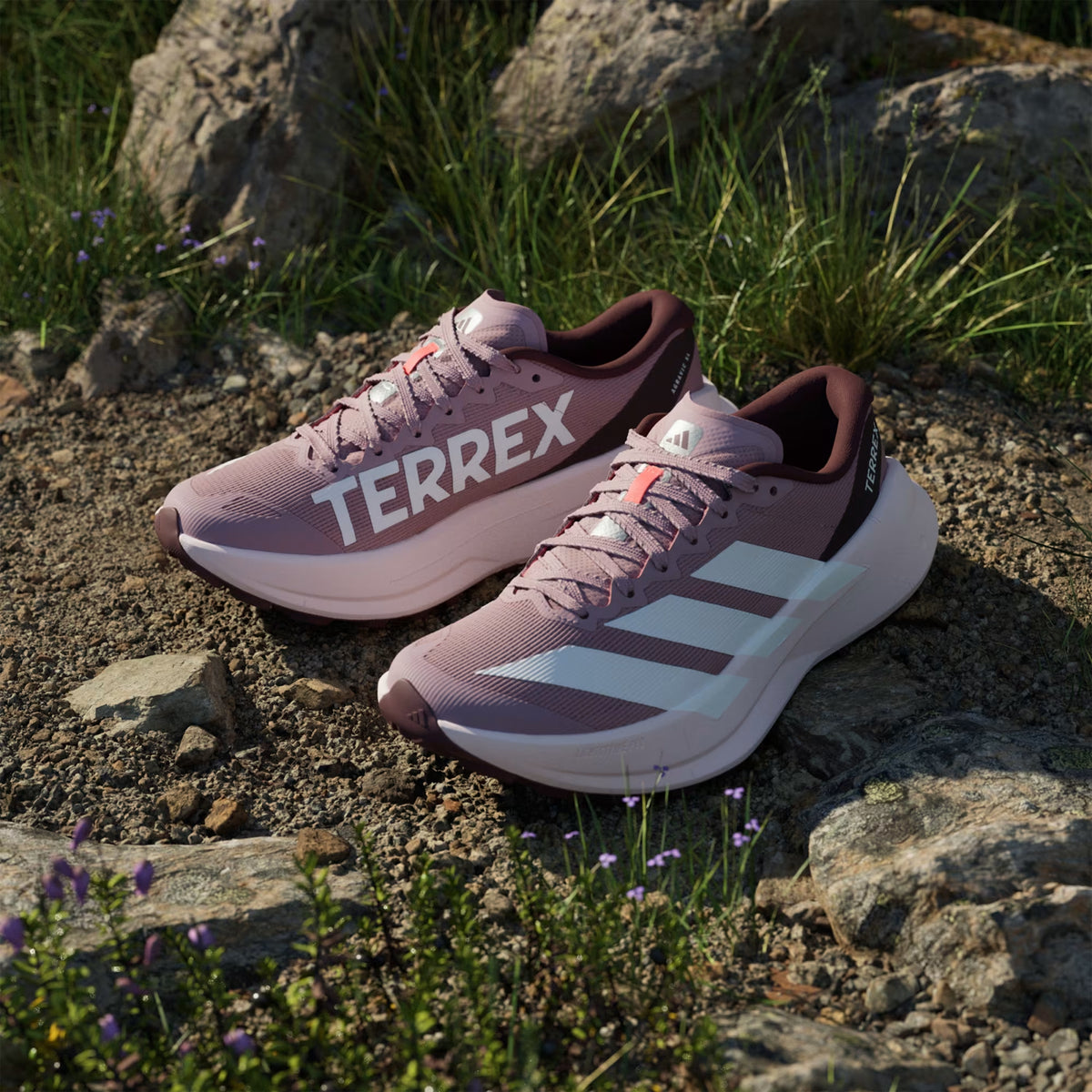 Women's adidas Terrex Agravic SL Trail Running Shoes Magic Mauve Cloud White Maroon top view showing engineered mesh upper with durable TPU overlays and elastic tongue wings for breathable trail running