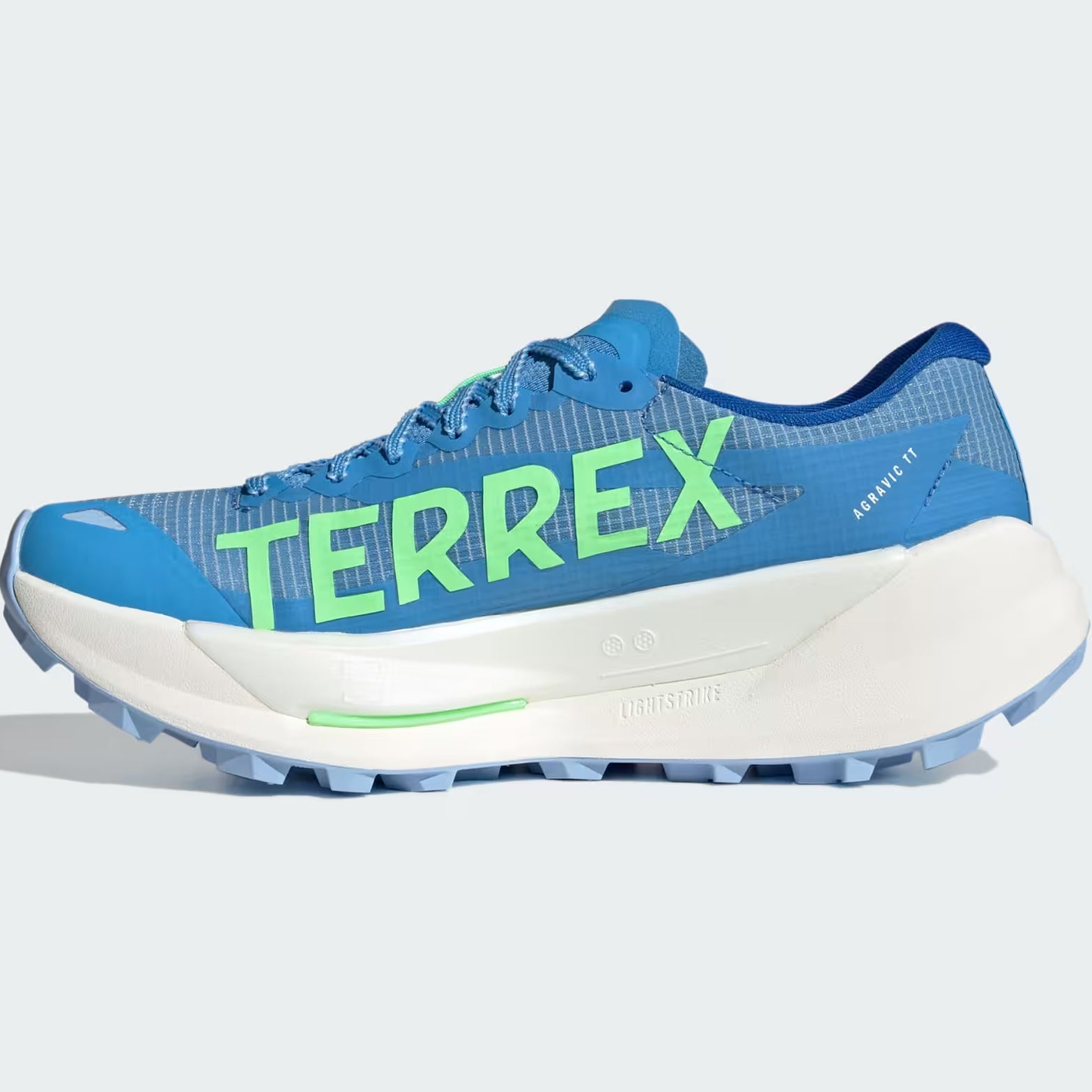 Women's adidas Terrex Agravic TT Trail Running Shoes Blue Burst Dash Grey Lime Burst inner side view showing responsive LIGHTSTRIKE PRO midsole with trail-gripping outsole for rocky terrain